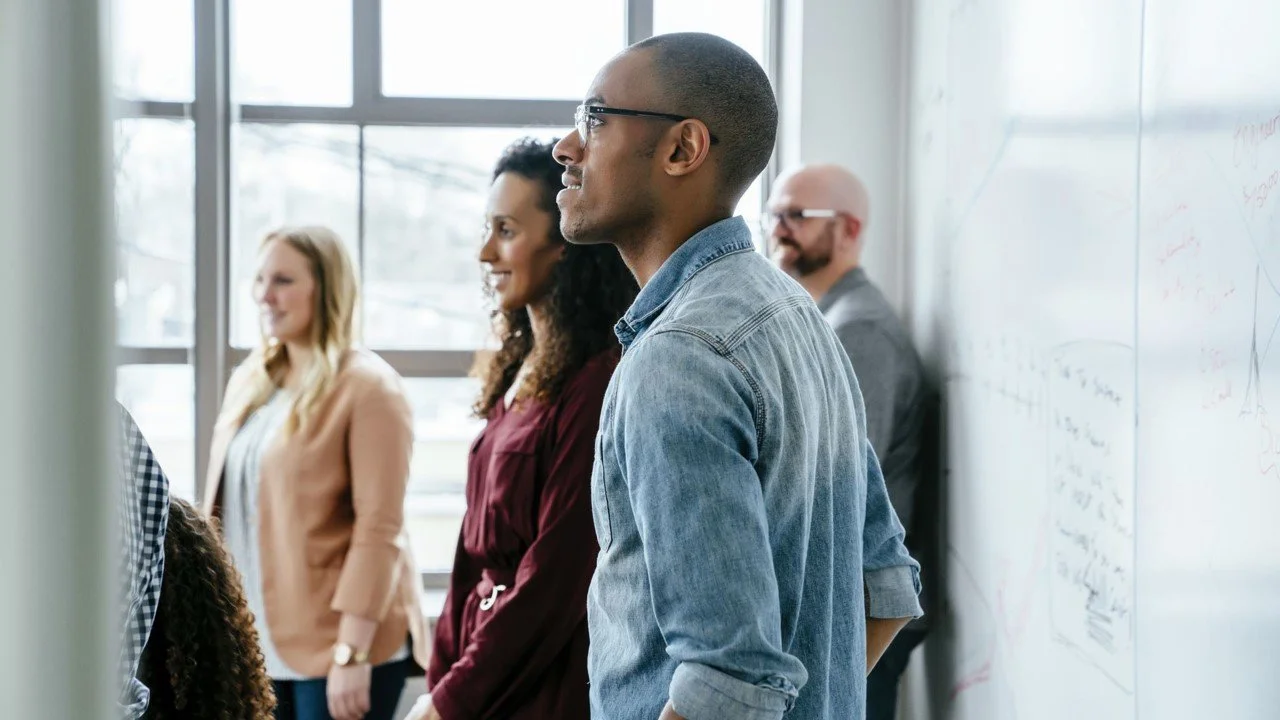 BD Dynamics training group standing during a professional business development workshop.