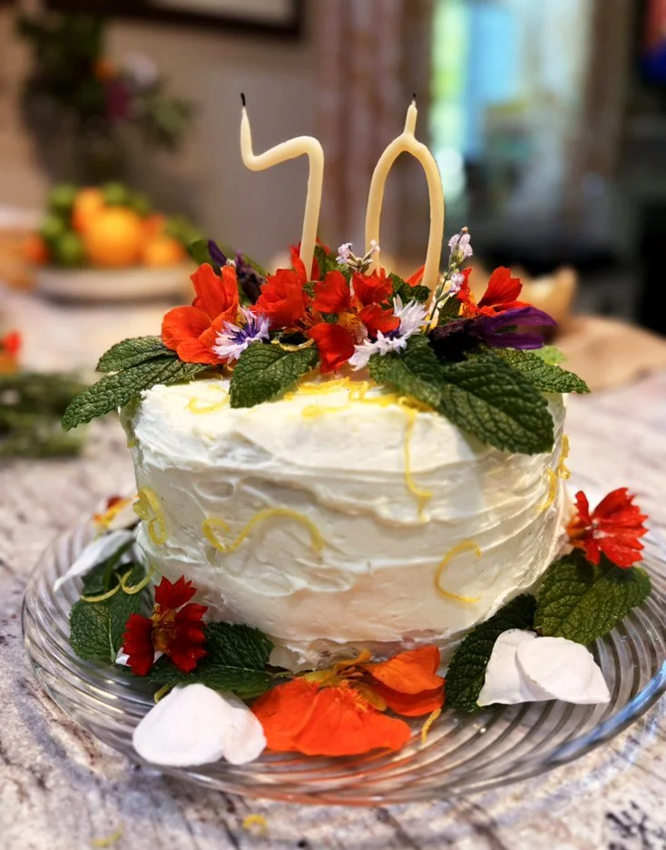 Cake for a 70th birthday with edible flowers