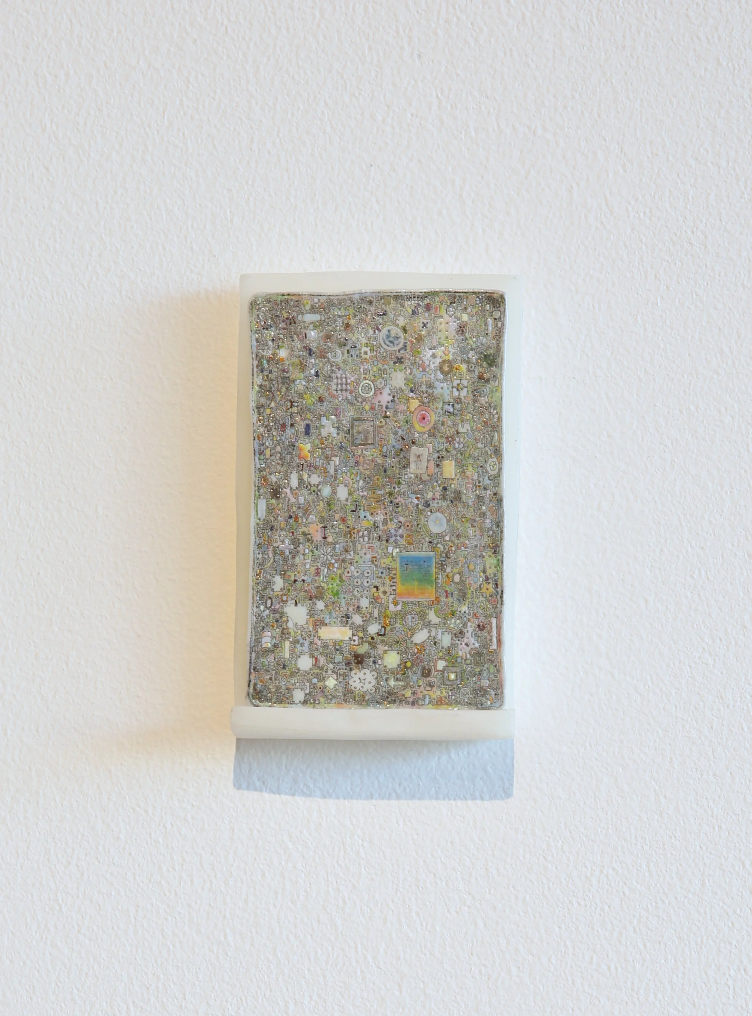 Trey Ross. 030 . 2026. Metal etching on porcelain, glaze, over glaze, and urethane shelf. 5 x 3 inches.
