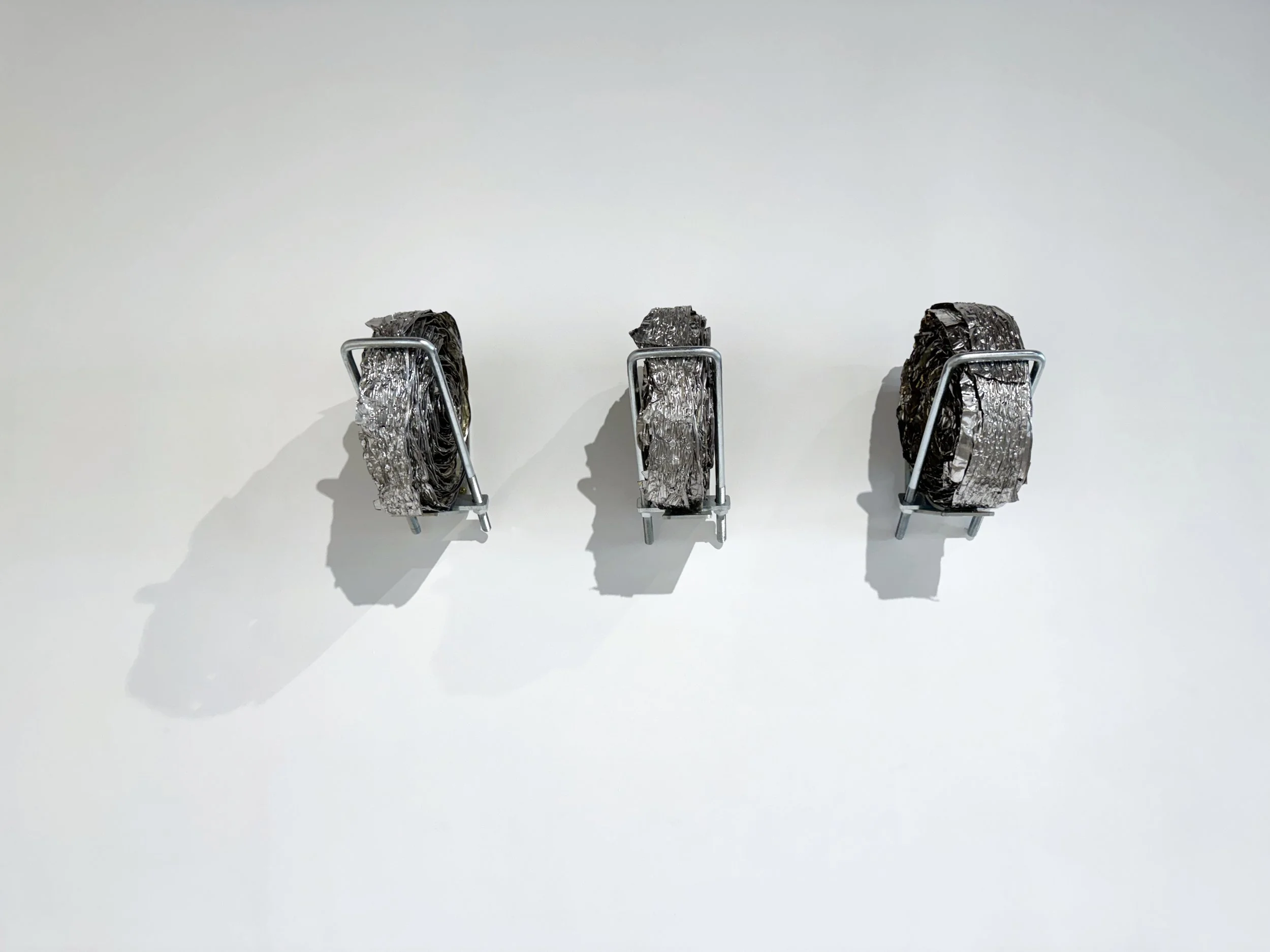 Solomon Rousseau. IIIA, VIIA, VIA (2026). Tin-plated steel, rivets; steel bracket, steel U-bolt, screws.