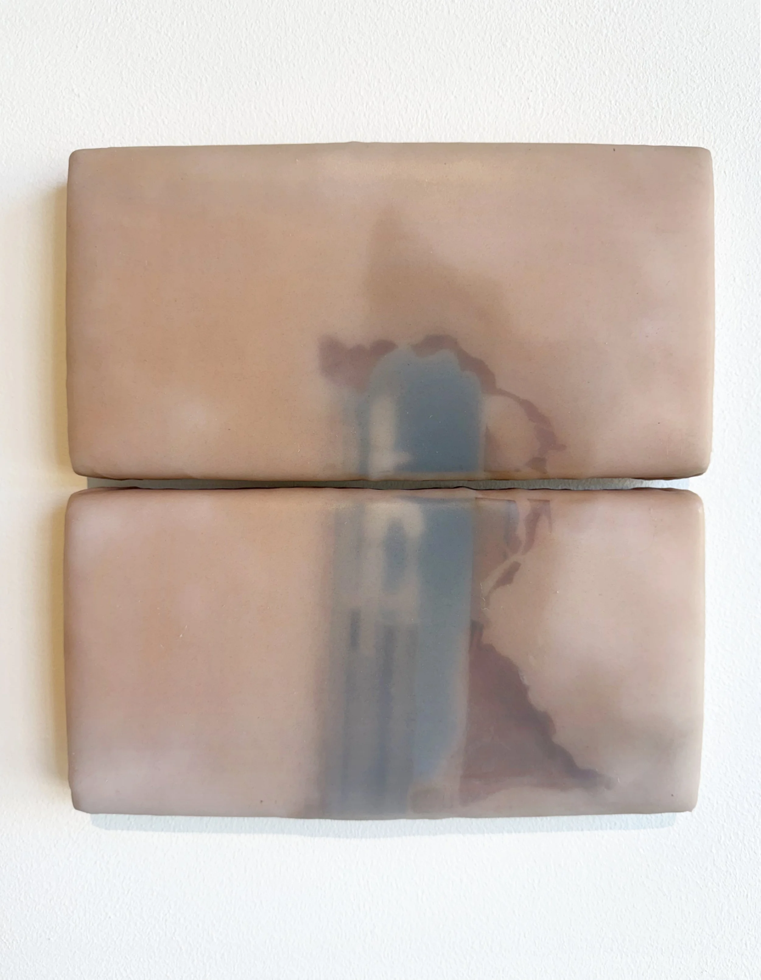 Matthew McGaughey. Hole Theory #4 . 2024. Silicone rubber, airbrush, and canvas on wood panel. 12 x 12 inches. [Installation view (Day)/ Noon.]