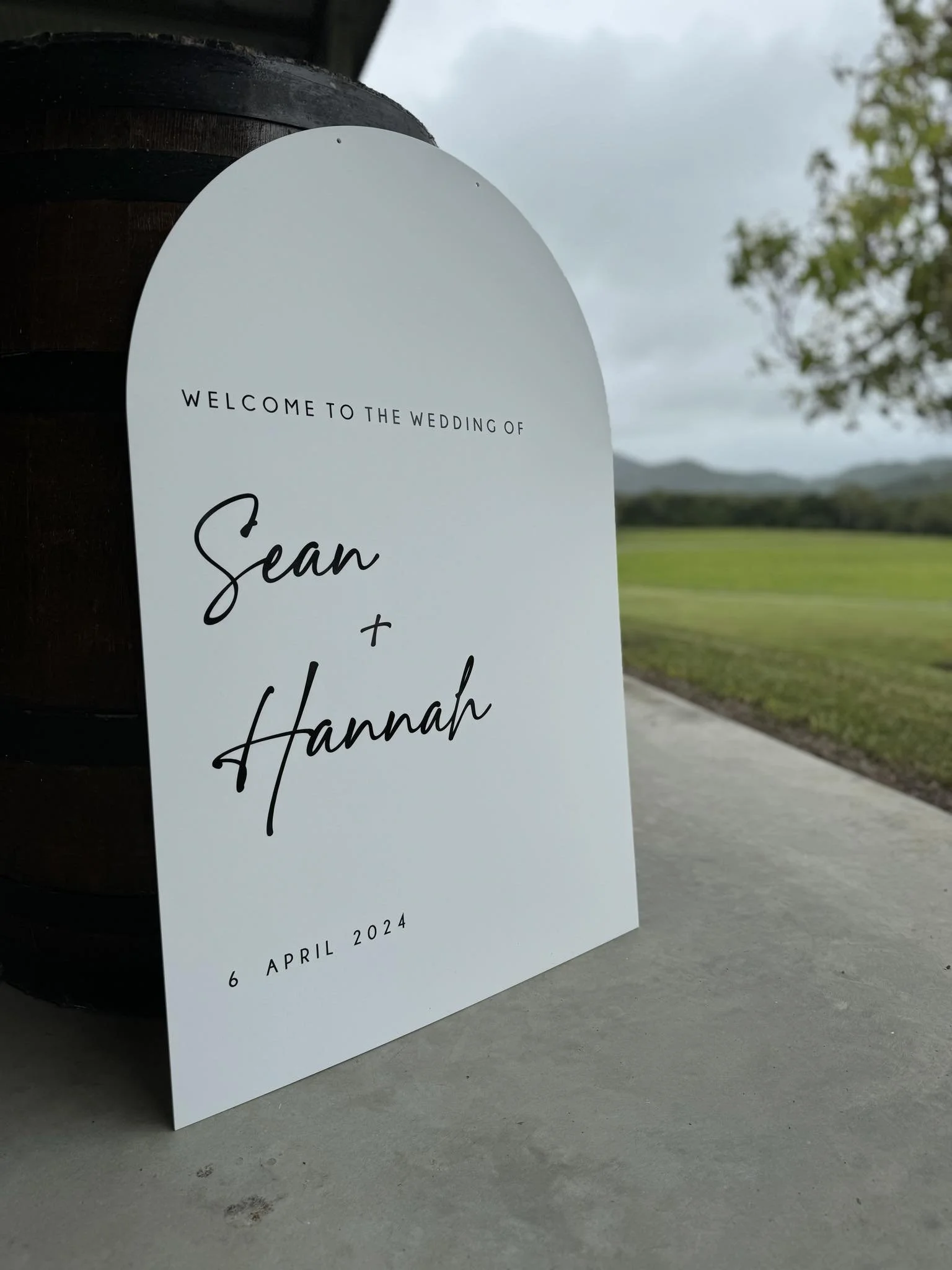 White Acrylic Arch with Black Acrylic & Vinyl text