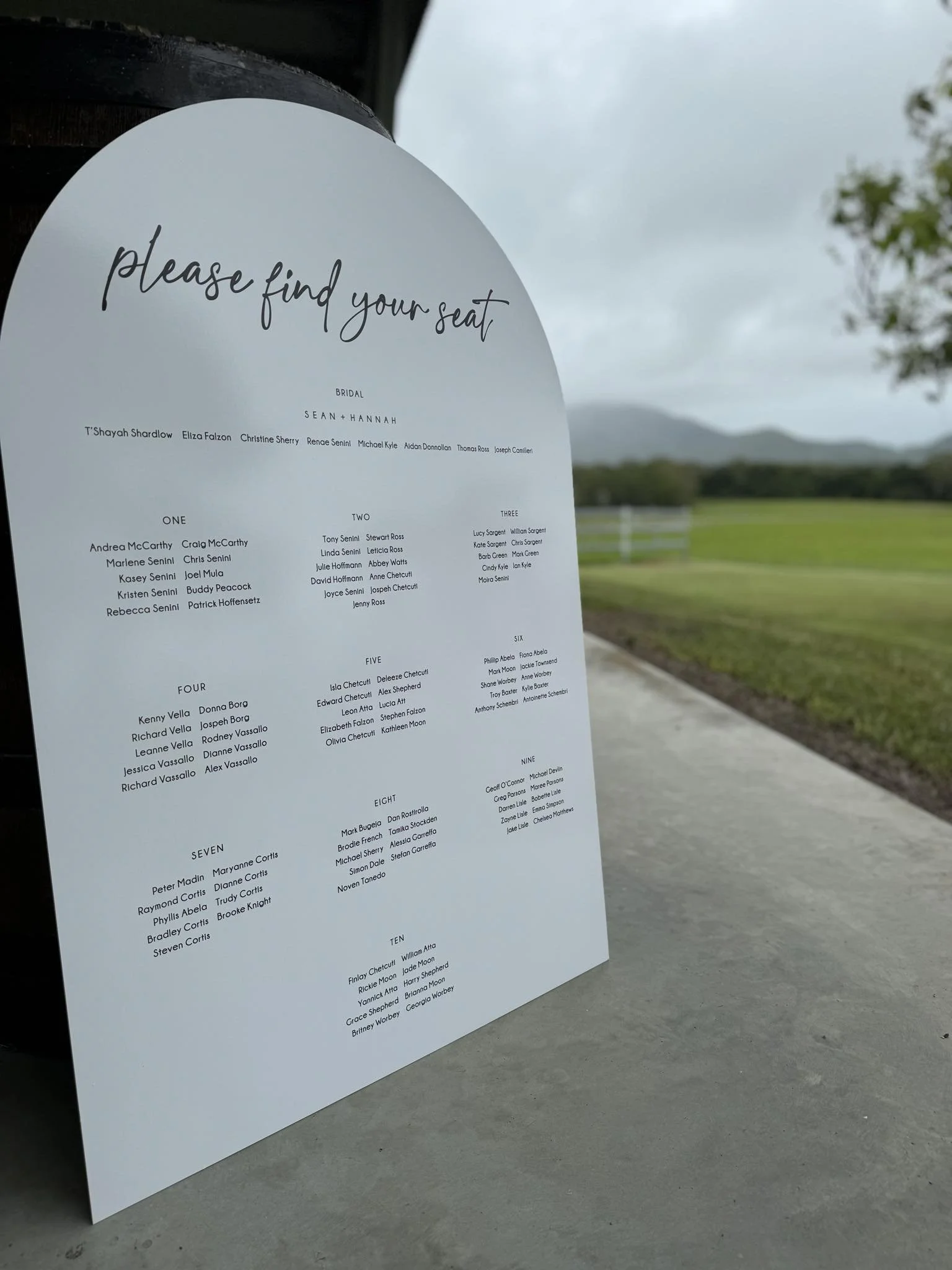 White Acrylic Arch with Black Text