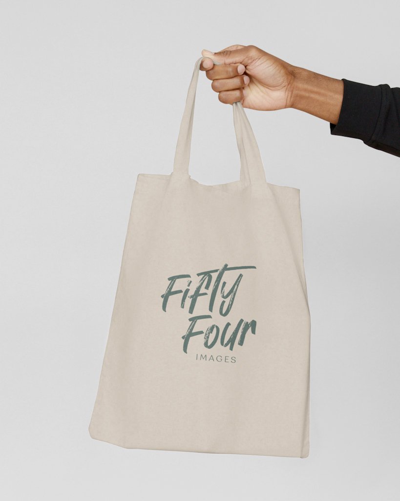 Canvas Bag with Hand Mockup.JPG