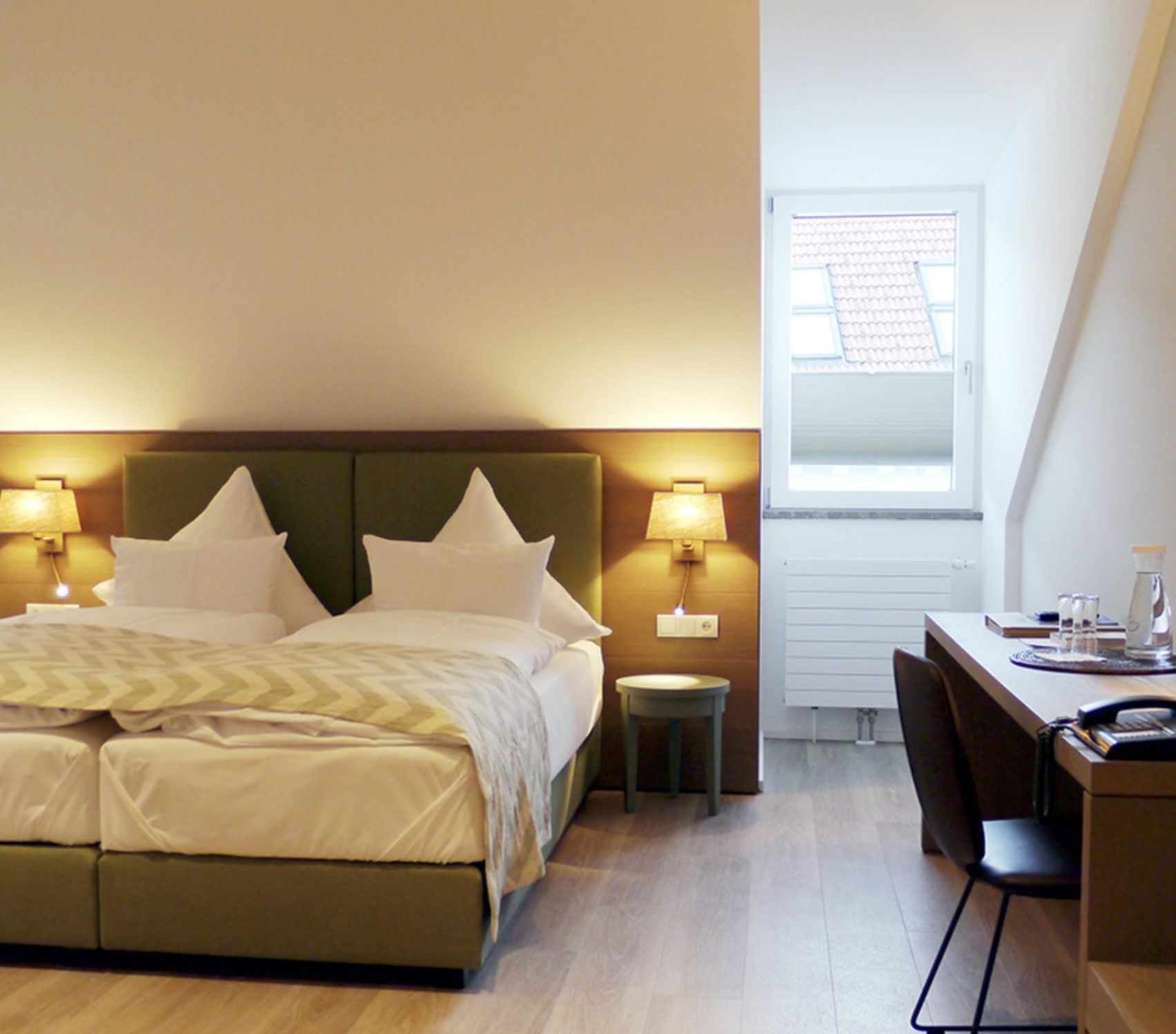 hotel room bed bavaria wellness.png