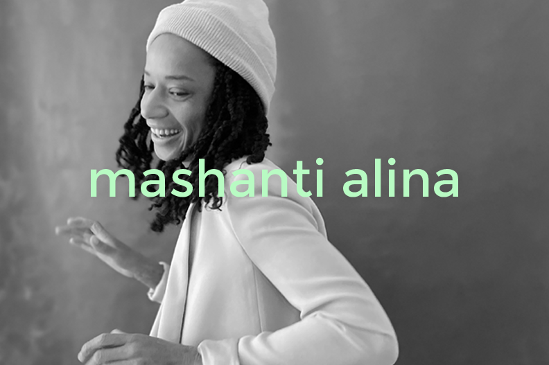 Black and white portrait of a smiling woman with curly hair wearing a beanie and light-colored blazer, with the text 'mashanti alina' in light green across the image.