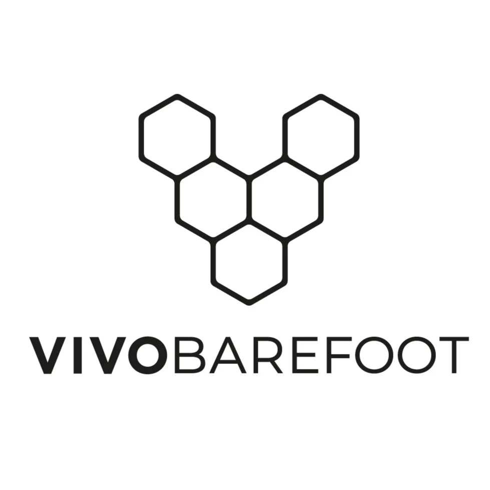 Logo for VIVO BAREFOOT featuring a honeycomb-style hexagon design above the words 'VIVO BAREFOOT'.