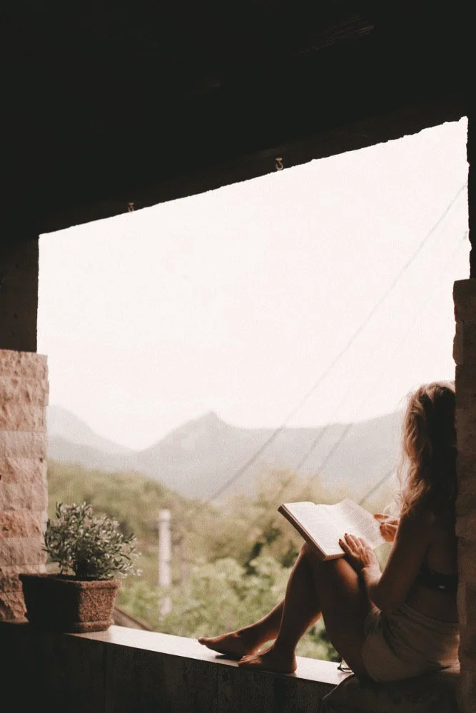 women reading in nature rest .JPG