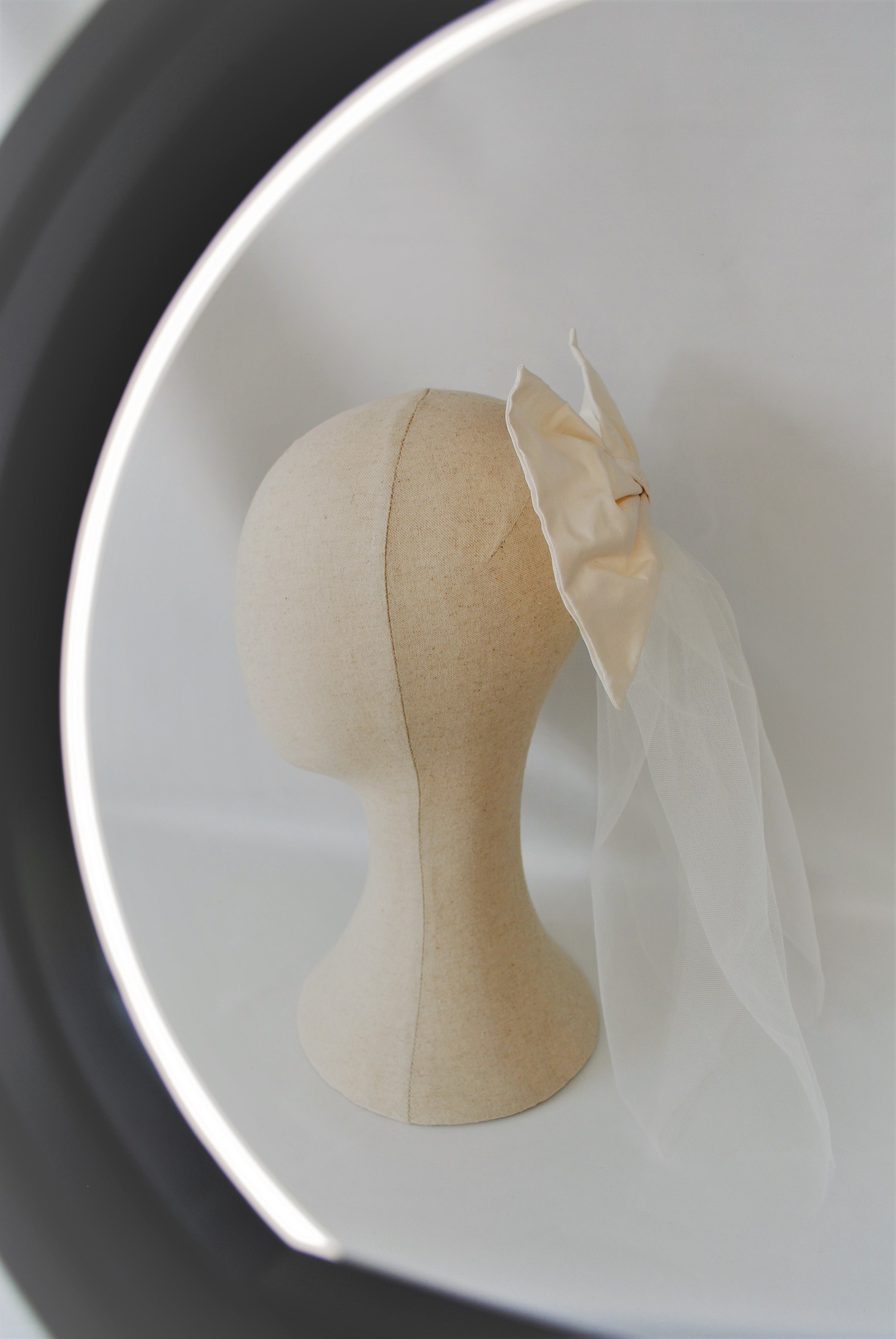 single ivory bow ring.jpeg