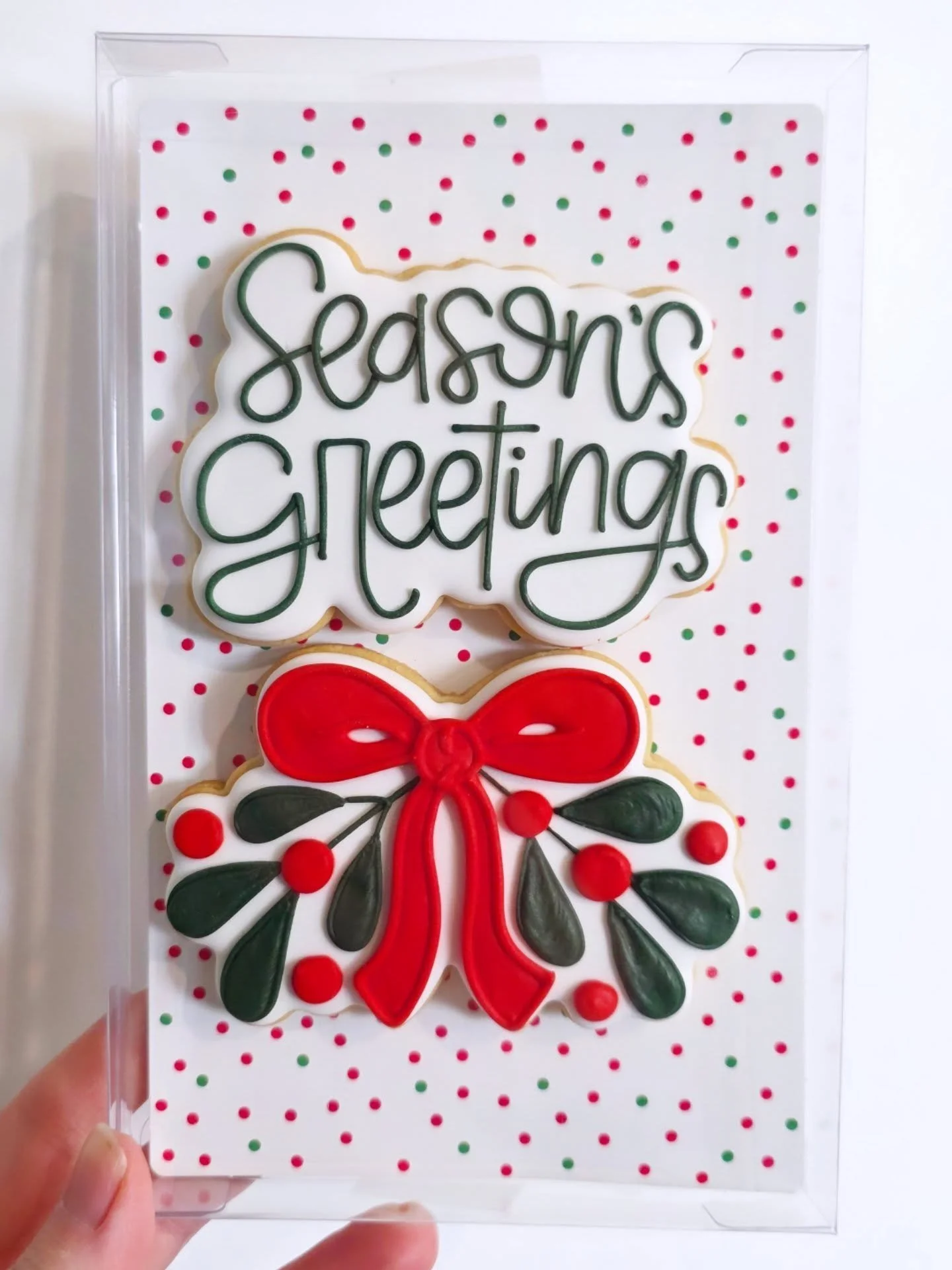 Nightmare to photograph without a reflection but super cute as an easy gift for that teacher, day care provider, bus driver, or neighbour in your life! 2 sugar cookies in cute packaging and available for preorder with pick up til December 23rd! 🎄
.
