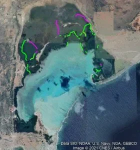 Satellite image of a large water reservoir with surrounding land and roads.