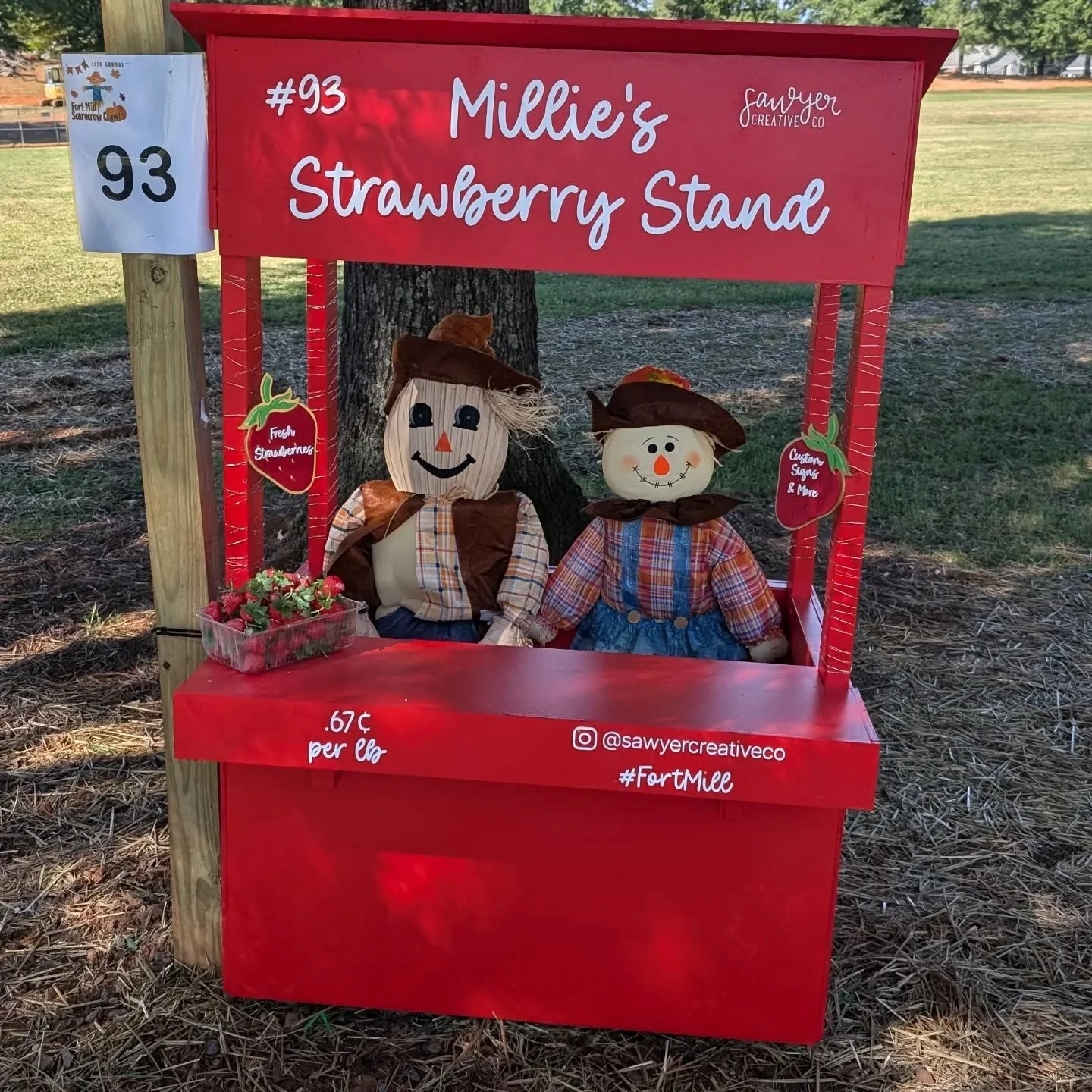 And here she is! Meet Millie's and her Strawberry Stand! 
Each year, our town puts on an amazing scarecrow festival where schools, businesses, special interest groups, and individuals participate, creating fun and unique scarecrows. 
 This year, w