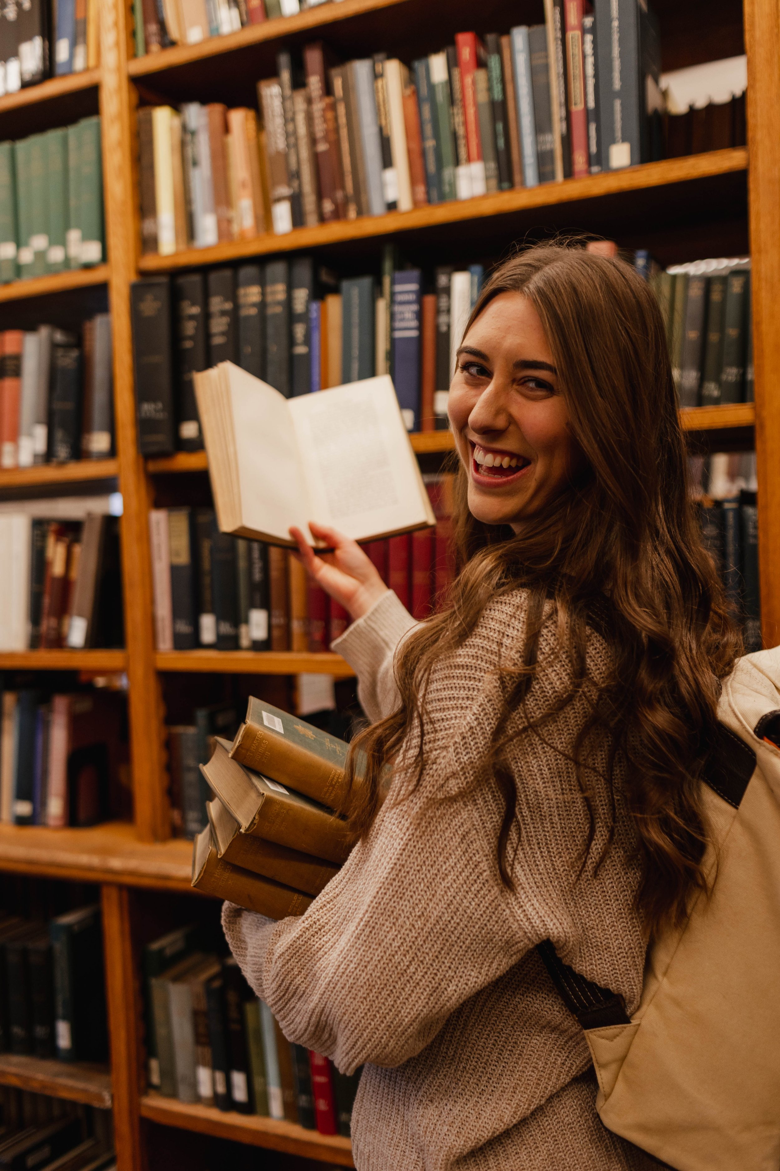 Laura Conaway picking five books to read from the library