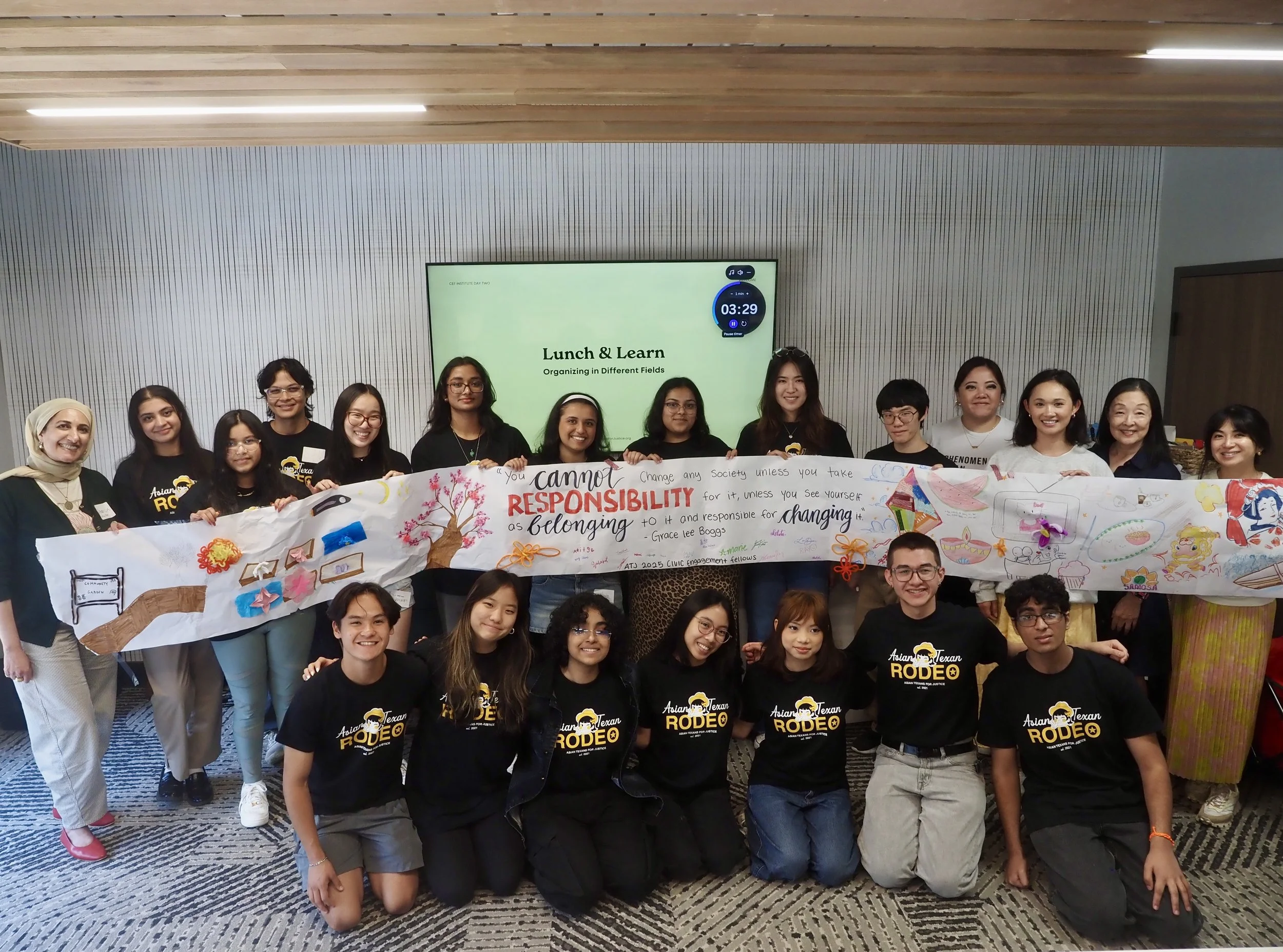 Group Photo w_ Banner.JPG