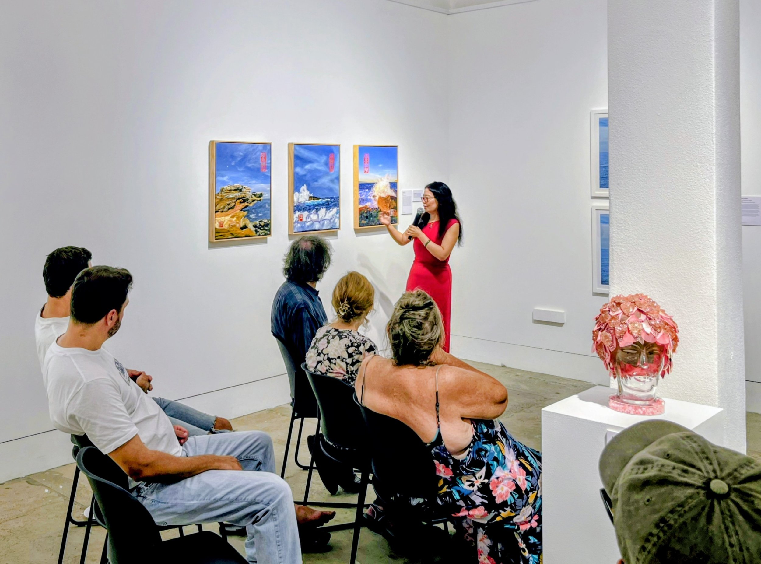 Jingmin Ren 任静敏 presenting an artist talk beside her Bondi Series at the Good Together exhibition, Bondi Pavilion, Sydney, 2026.