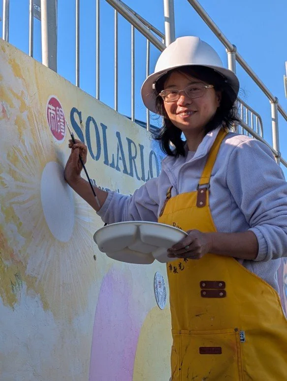 Artist Jingmin Ren 任静敏 painting Solar Longitude – Time Orbit《太阳黄经－时间轨道》on site at Bondi Sea Wall, Sydney, 2026.