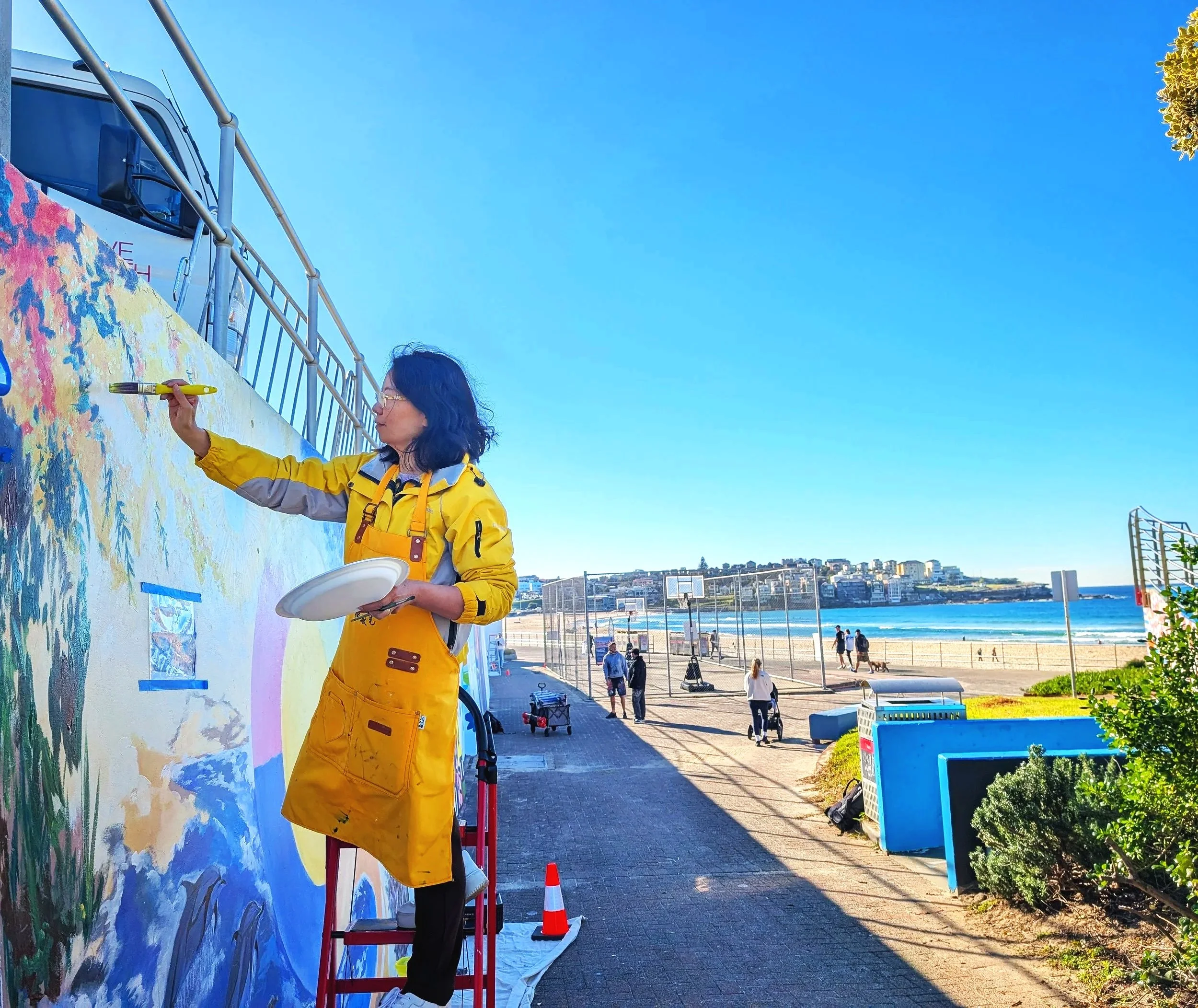 Jingmin Ren painting Solar Longitude – Time Orbit at Bondi Sea Wall in Sydney in 2026
