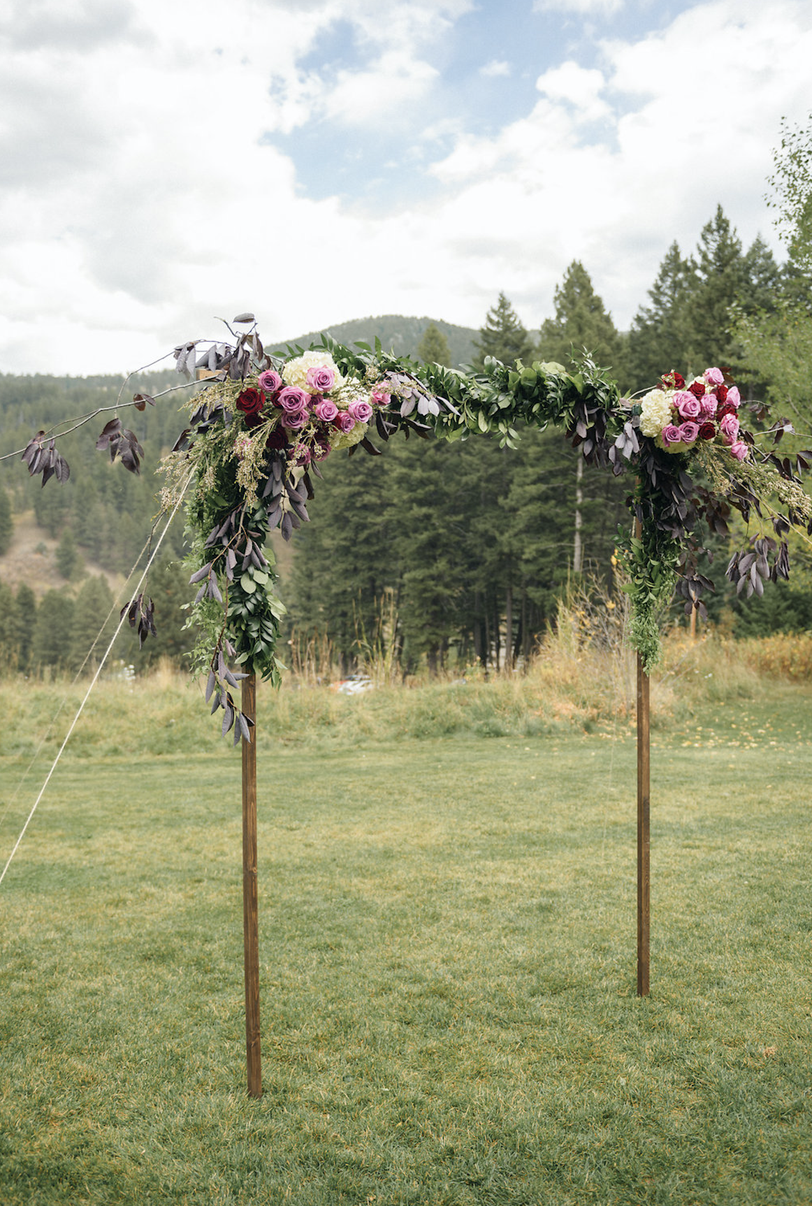 Simple-beautiful-arch-wedding-ceremony-montana2caseyq.png
