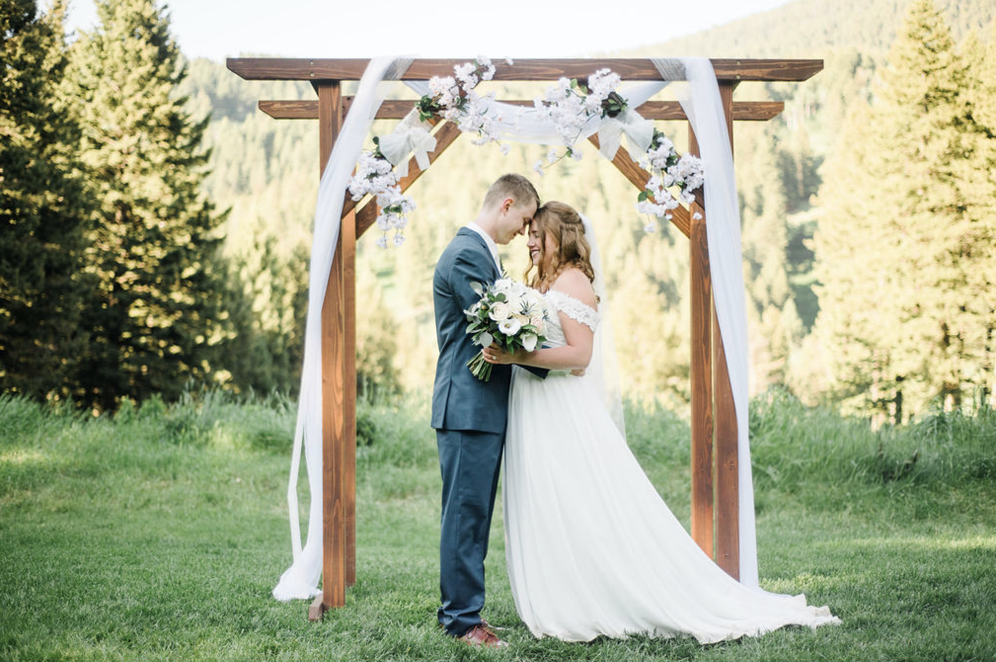 White-flowers-arch-wedding3-woodlands-kody-dustin.png