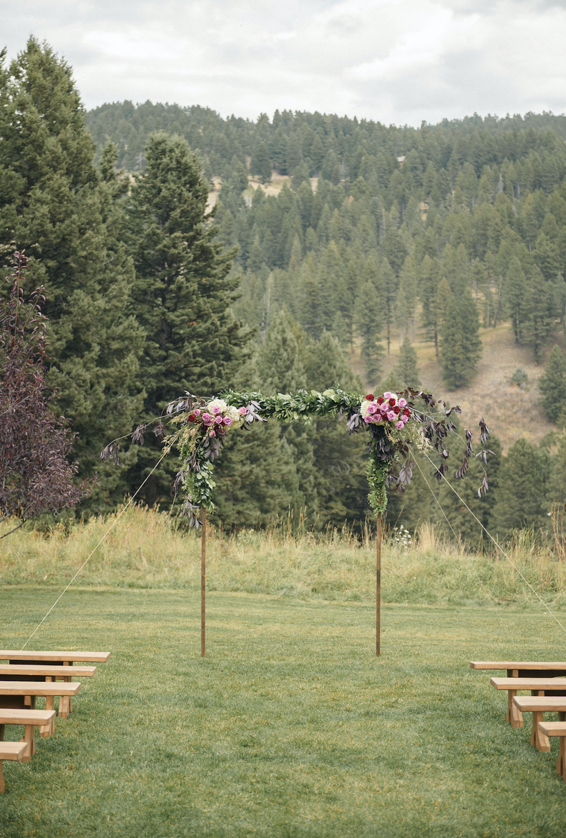 Simple-beautiful-arch-wedding-ceremony-montanacaseyq.png