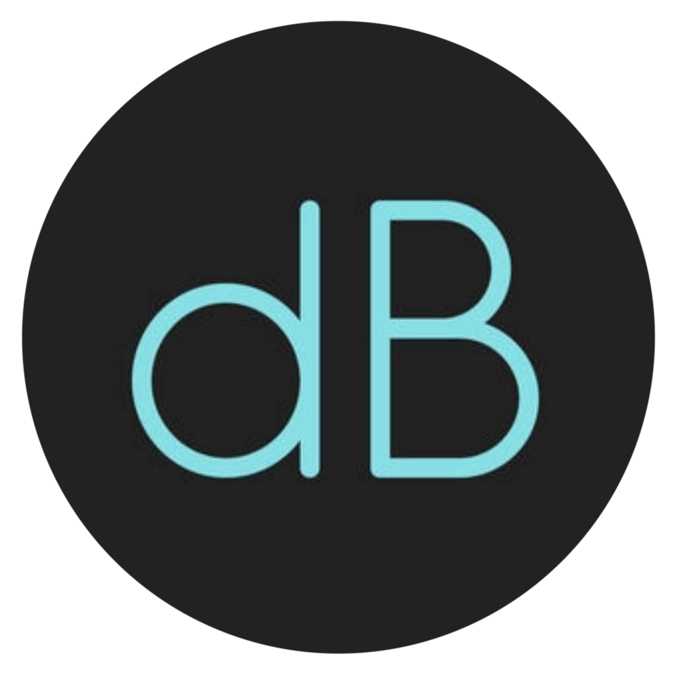 Neon sign displaying the letters 'dB' in blue on a black background.