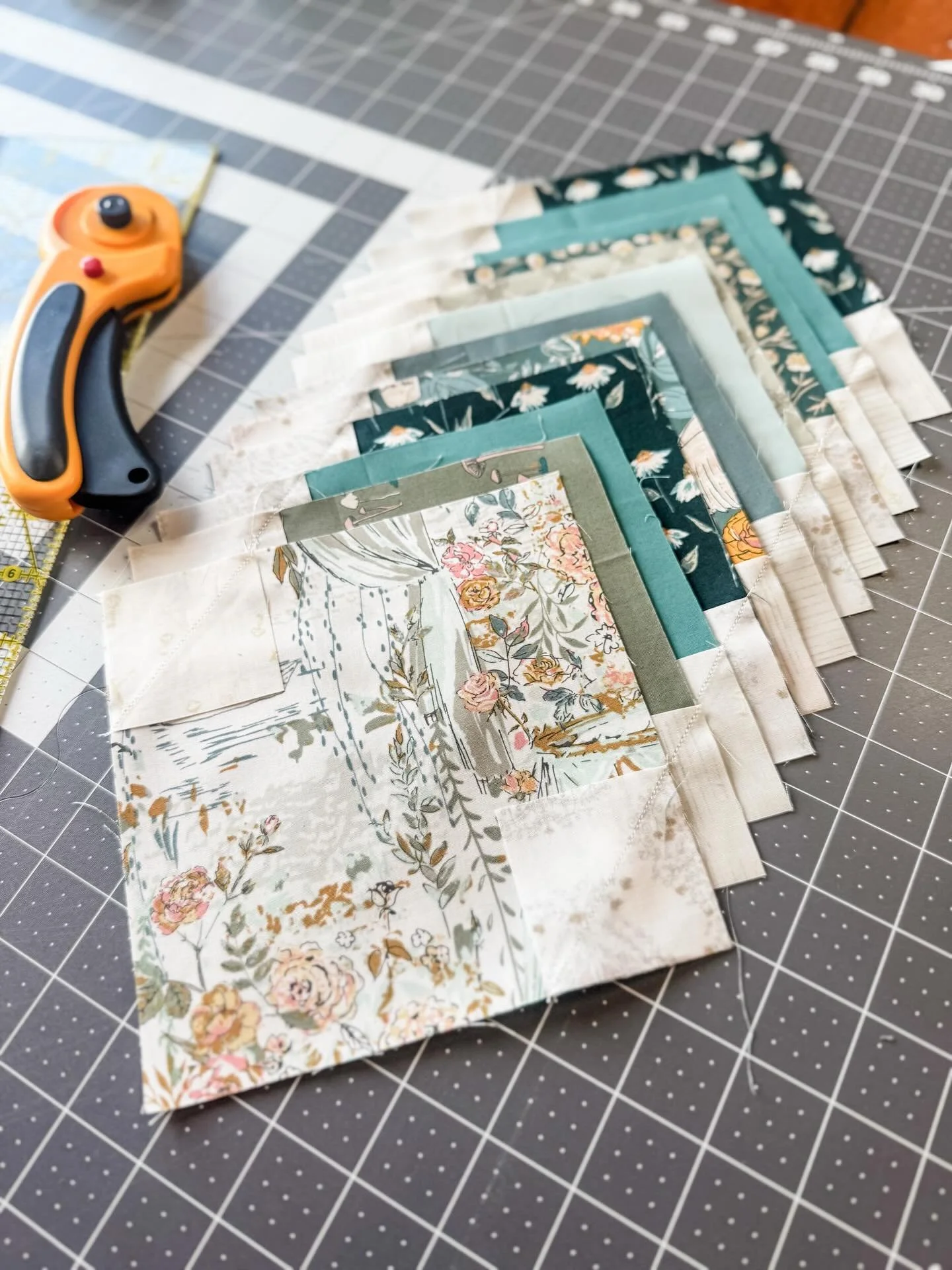 Back at the cutting mat for a different version of my Clover and Magnolia Quilt pattern (releasing at the end of April)

I just finished the quilt top for one version, and now I&rsquo;m working through the scrappy FQ version&mdash;trimming pieces and