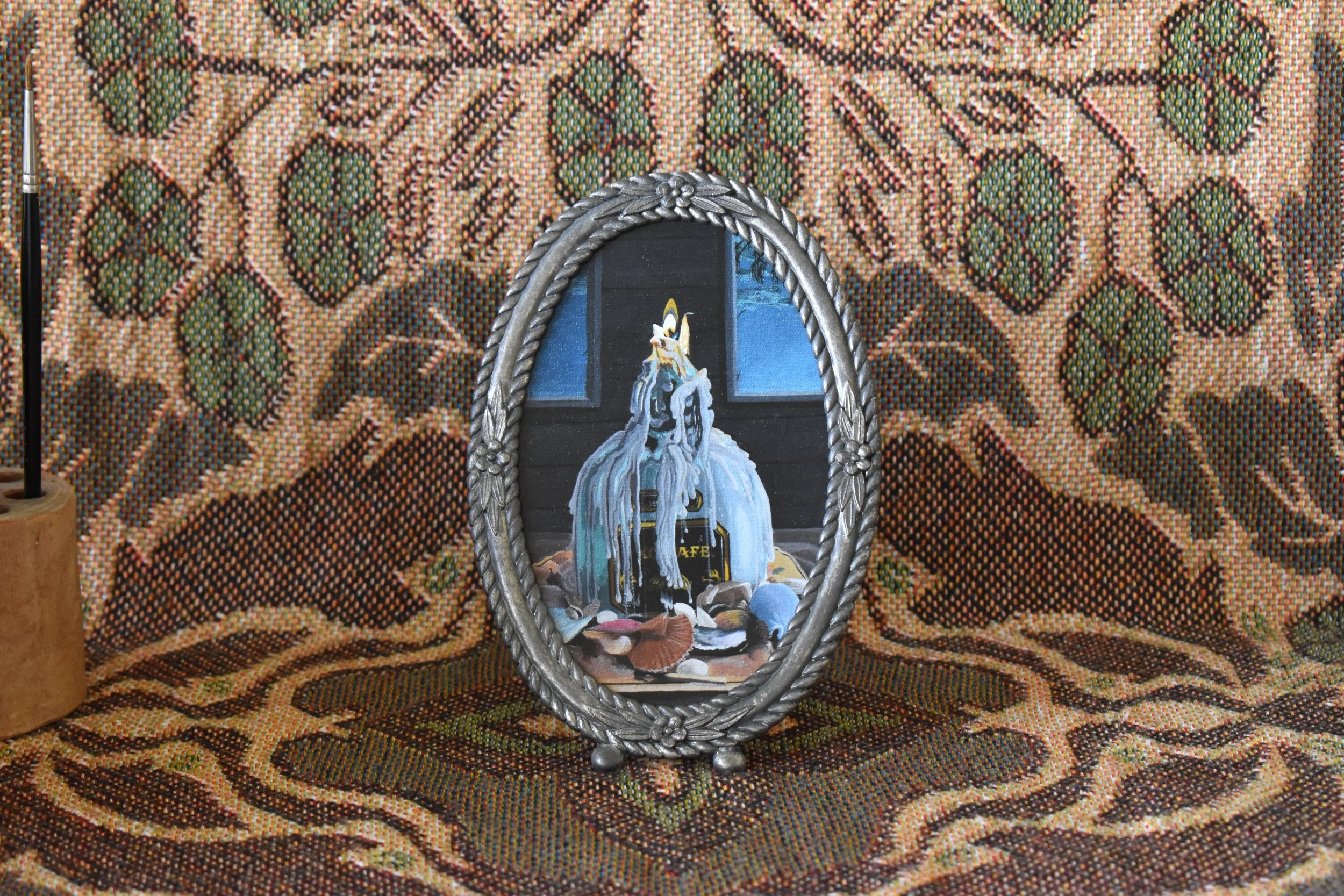 Shrine print in vintage silver frame