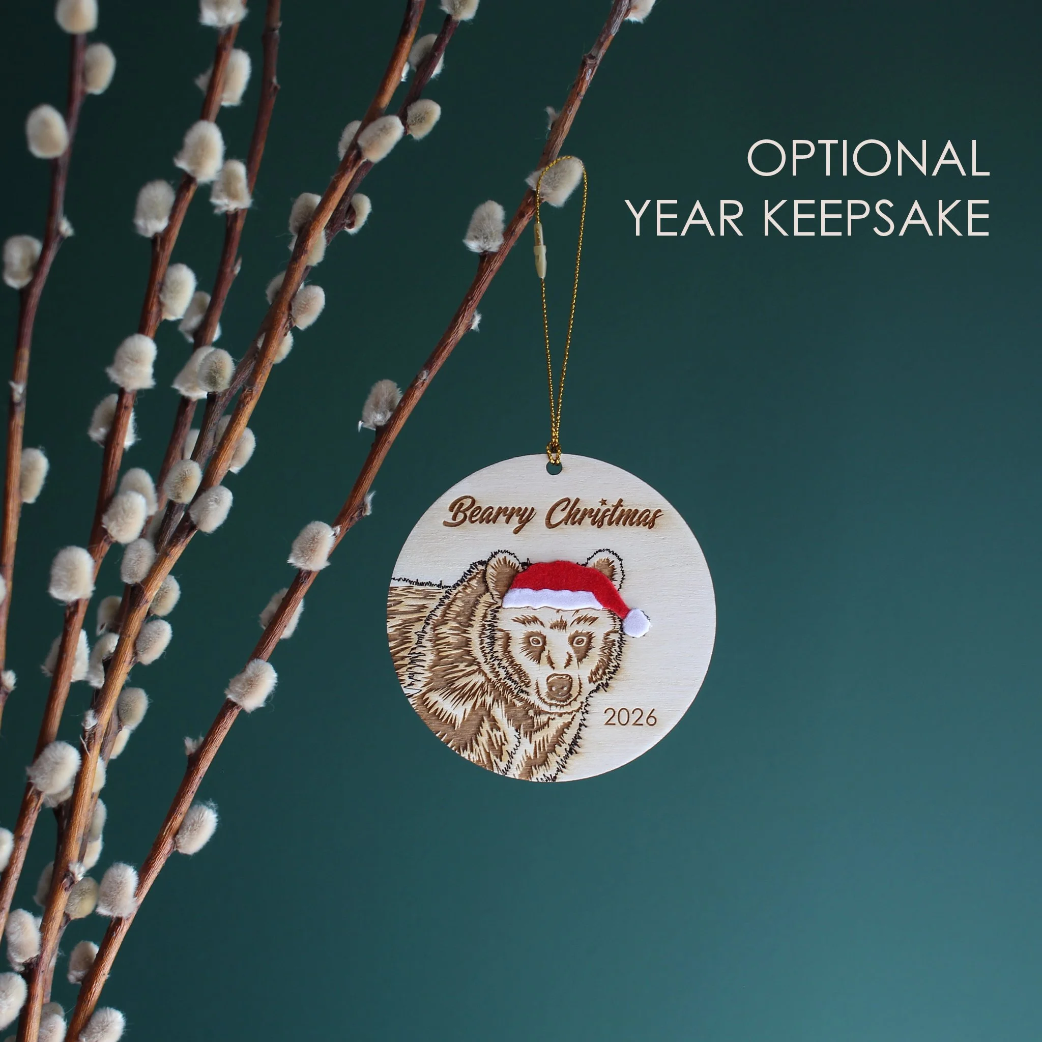 Wooden bear Christmas ornament with optional 2026 year engraving, featuring an original hand-drawn raccoon in a Santa hat and festive Christmas pun.