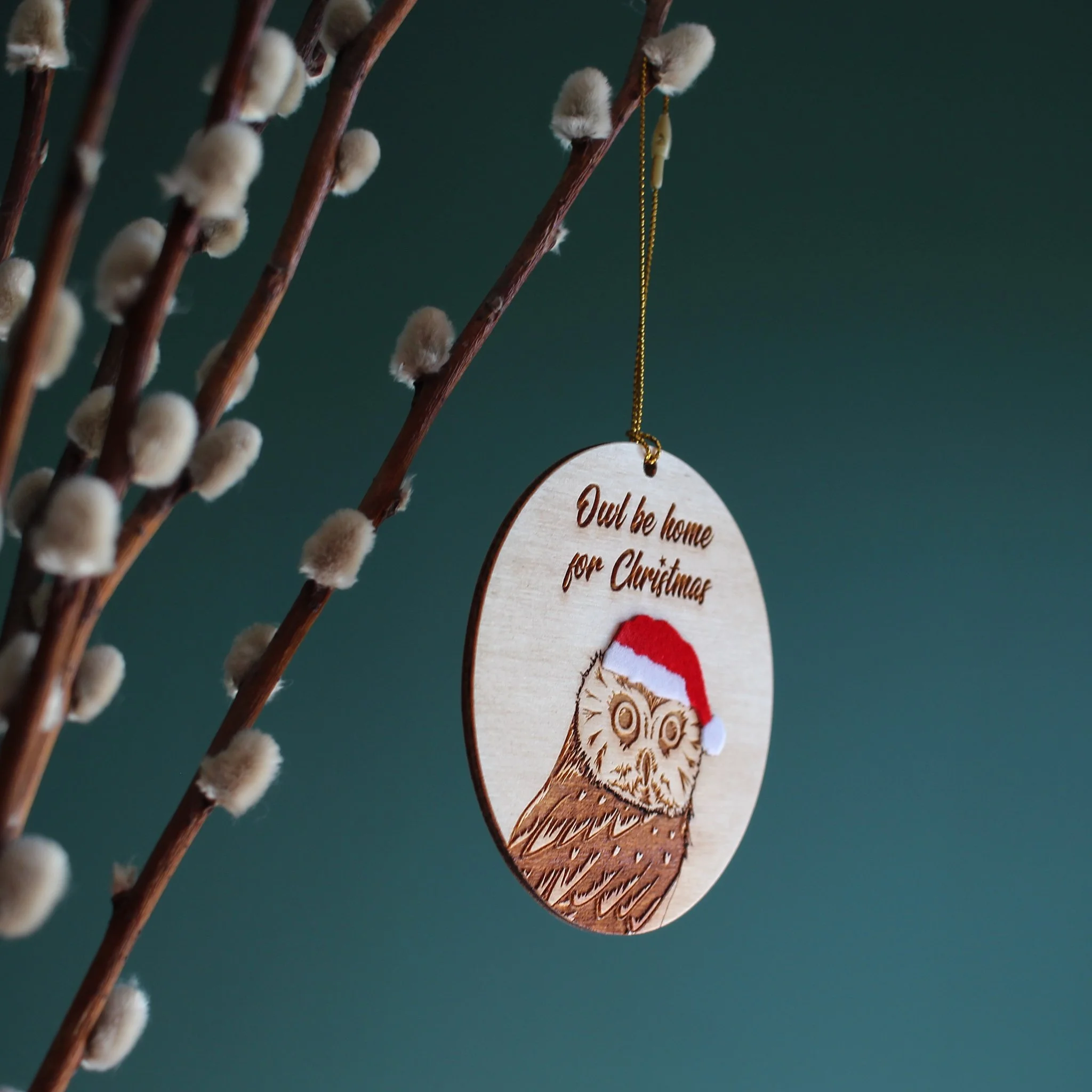 Side view of hanging Owl ornament. The mix of texture and layers add interest to this handcrafted, original piece designed and made by a small business based in the UK.