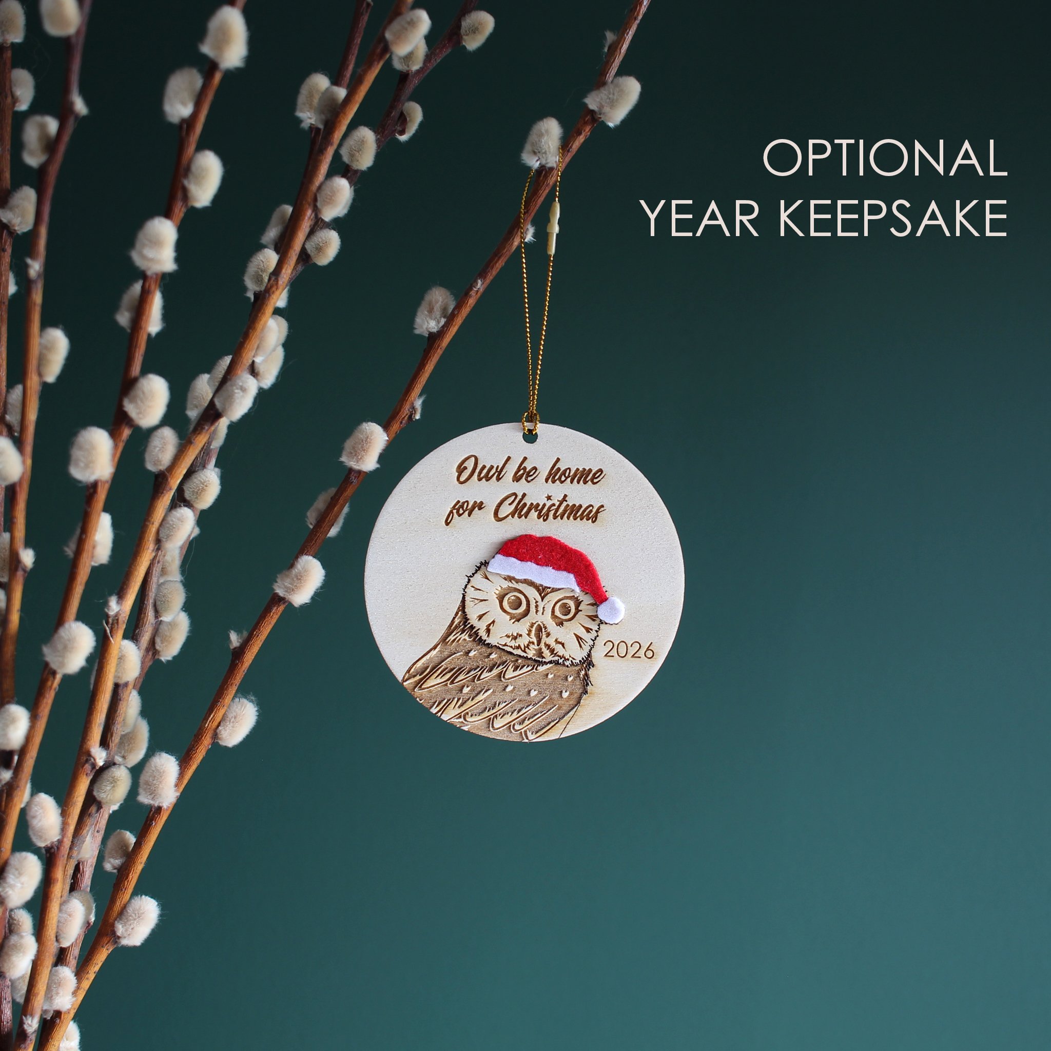 Wooden owl Christmas ornament with optional 2026 year engraving, featuring an original hand-drawn raccoon in a Santa hat and festive Christmas pun.