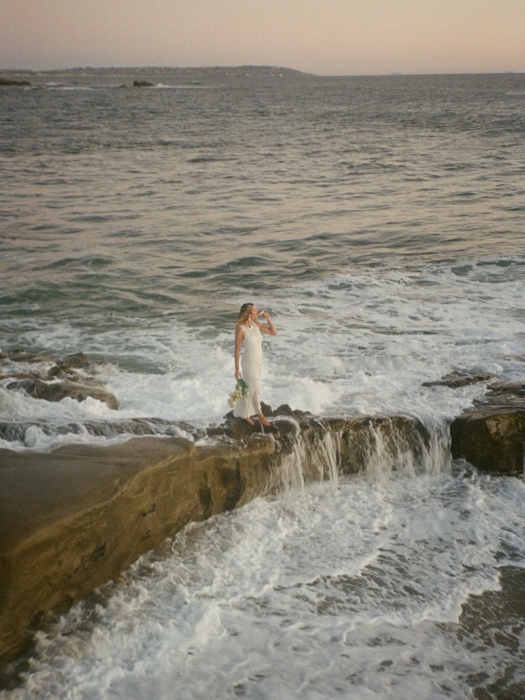 hannah &amp; the ocean 🌊

photo / concept: @jesslivingphoto 
planning / content: @forlifewithlove 
floral design: @regiondesignstudio 
dress: @thedressrentalco @hardingegeorgia 
model: @hannah_gelbart 
film scans: @richardphotolab