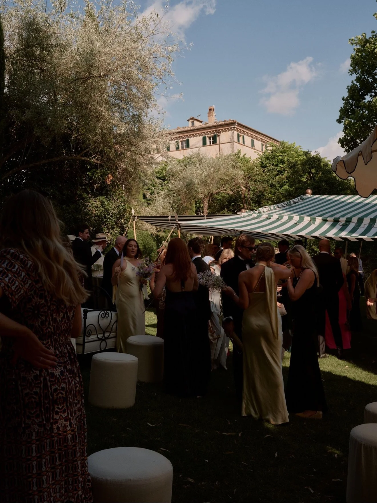 An elegant aperitivo in the gardens of @cetinale one hot July day.

The anticipation of the ceremony has faded.
A collective exhale.
They&rsquo;re married.

Champagne in hand.
Music drifting softly through the garden.
The first taste of dinner.
Guest