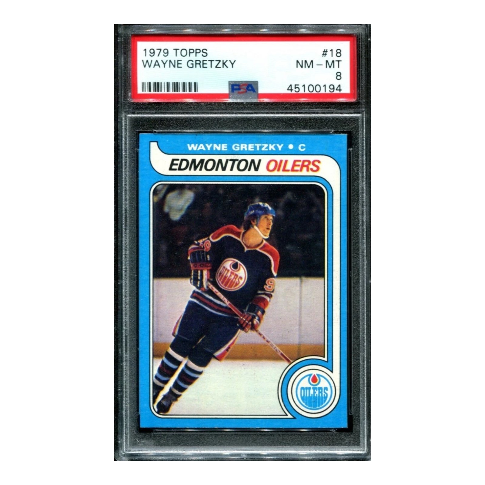 1979 Topps Wayne Gretzky rookie hockey card #18 in PSA 8 slab showing Gretzky skating in Edmonton Oilers uniform.