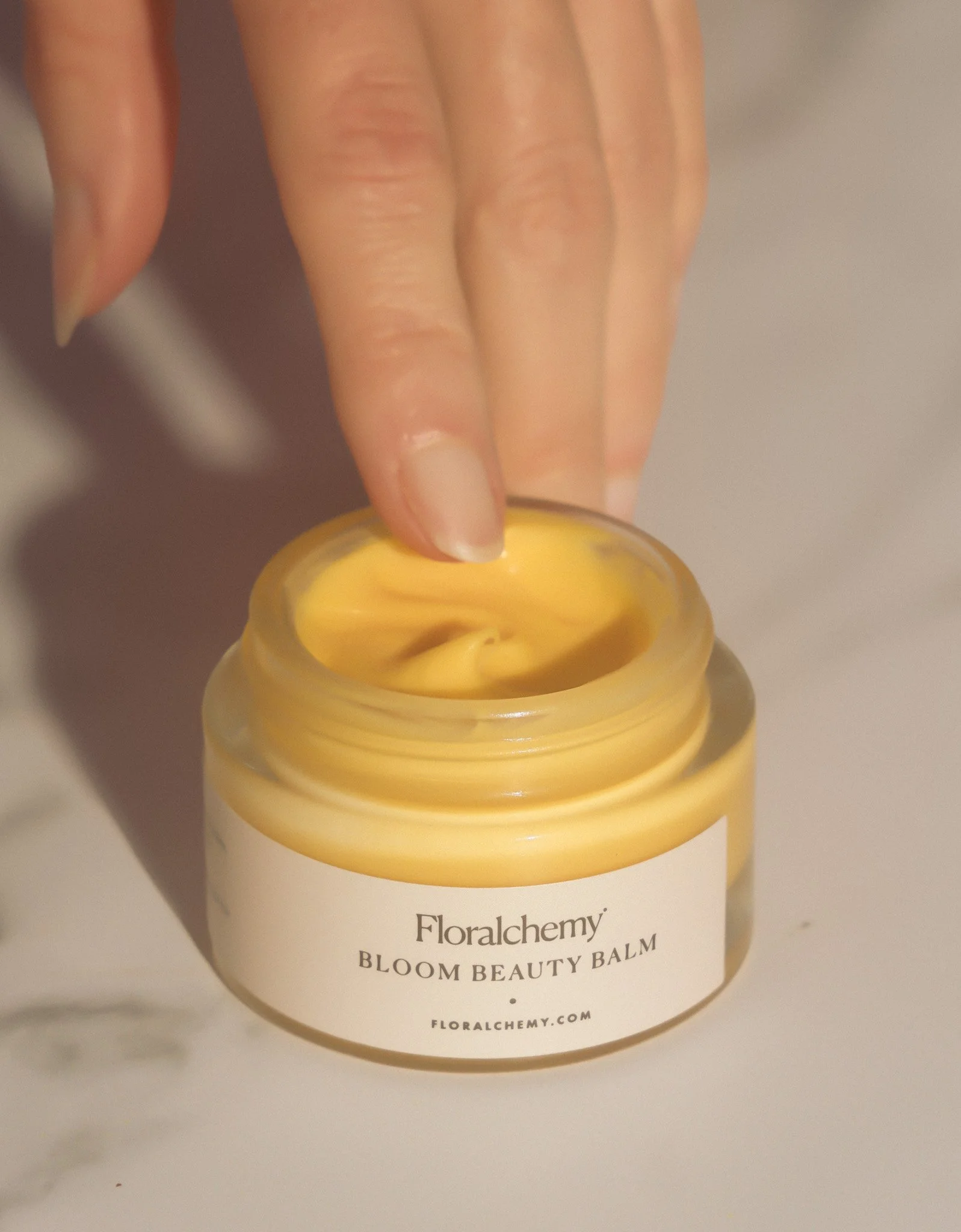 rose balm -yes hand.jpeg