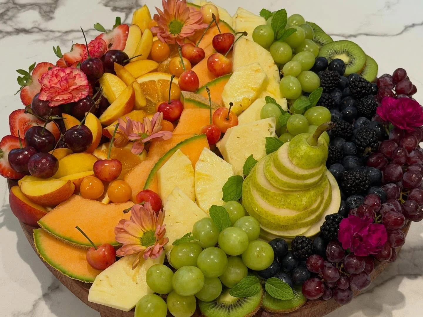 A beautiful rainbow fruit board! #rainbow #grazingtable #charcuterie #cheese #longisland