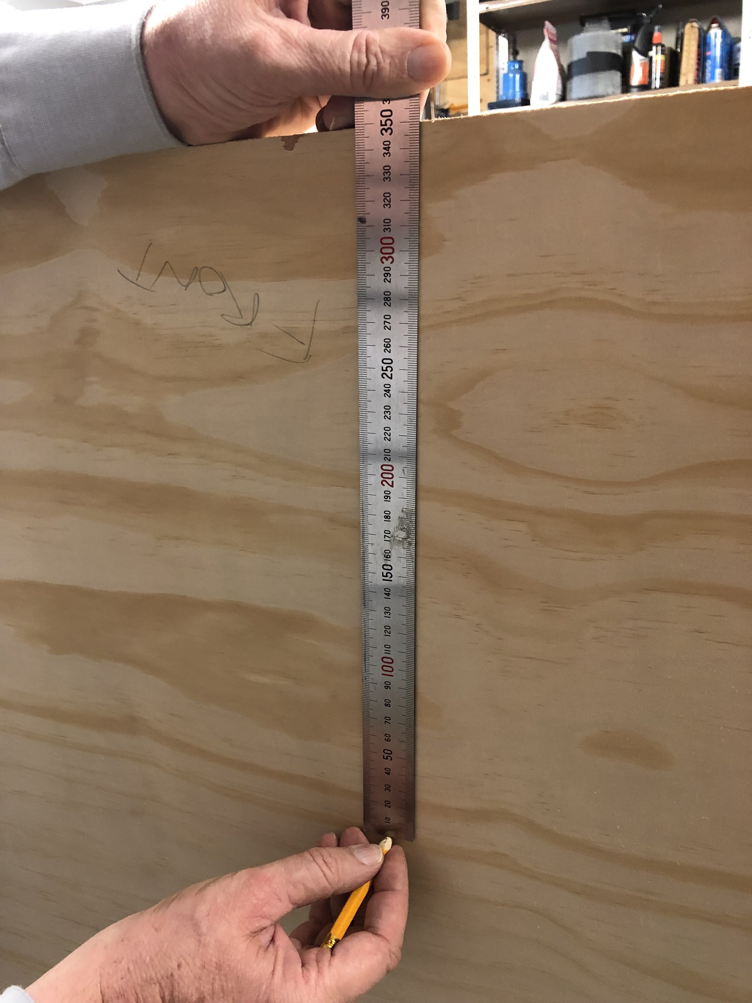 Measure and Mark where the shelf support will sit. 