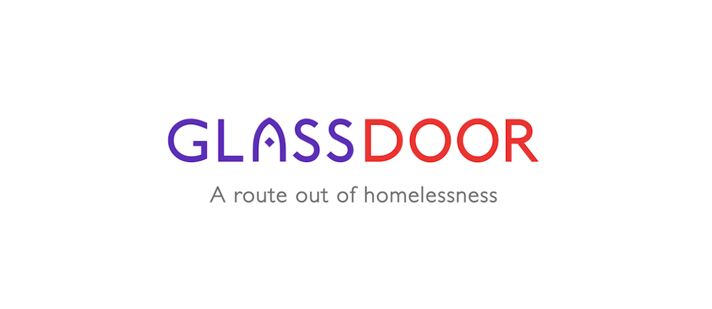 A logo with the words 'GLASS DOOR' in purple and red, and the tagline 'A route out of homelessness' underneath.