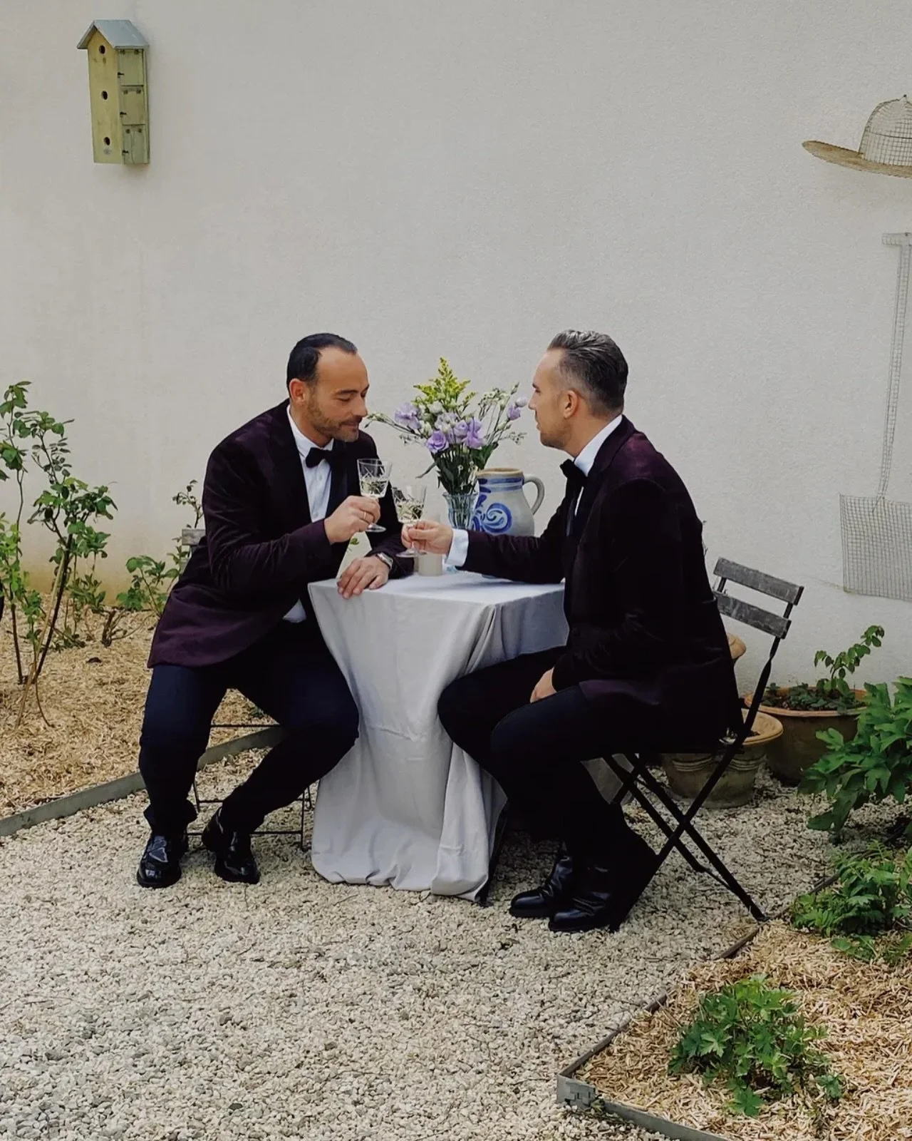 Love, unfiltered. Tucked away in the quiet embrace of the garden, an intimate table with a simple bouquet sets the stage for a quiet toast. 

A fleeting pause in the midst of celebration&mdash;one of many moments that will linger in the story of the 