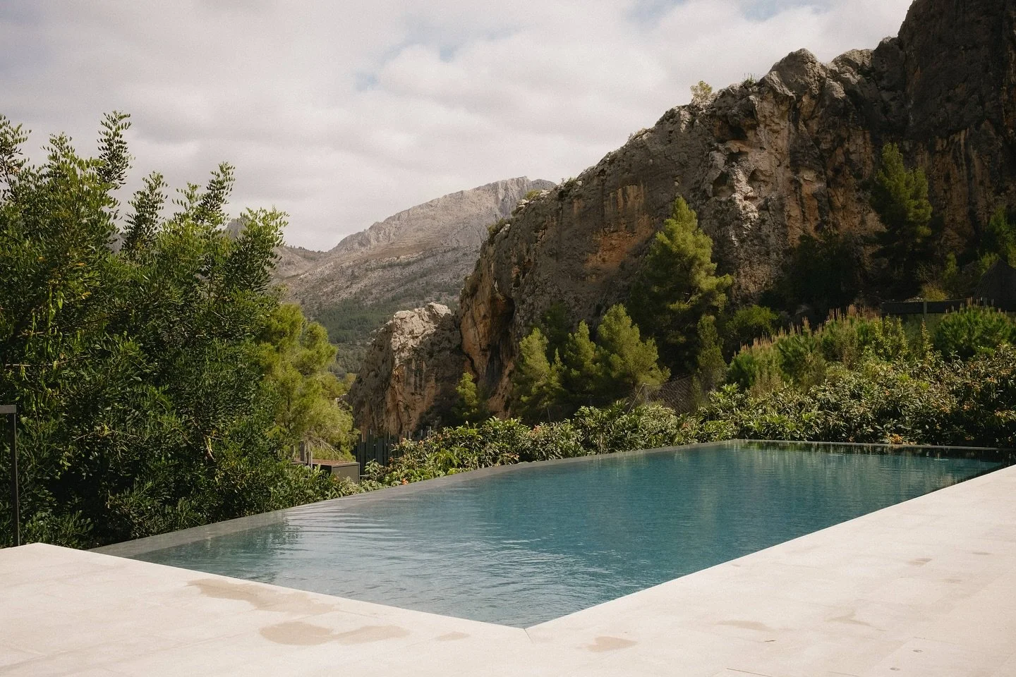 The beauty of a setting that simply exists, shaped by the strength and energy of its surroundings. 

The bliss of reminiscing about the big day on sun-drenched mornings, lounging by the pool under the Spanish sun&mdash;letting time unfold at its own 