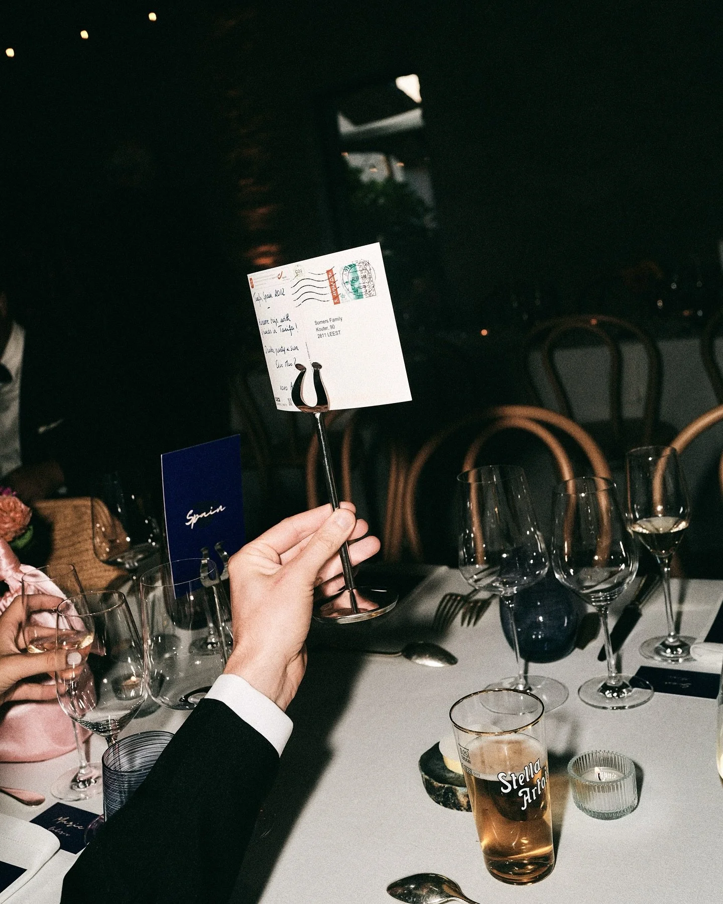 What&rsquo;s in a table number?
For this couple, more than just a seat.

Having traveled the world together, each destination held a memory&mdash;a story worth sharing. Instead of traditional numbers, guests were guided to their tables by postcards, 