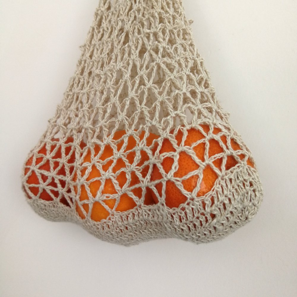 A close up of the hanging produce bag. The distinctive V shape is clear and the tighter stitch at the base to keep your veggies safe.