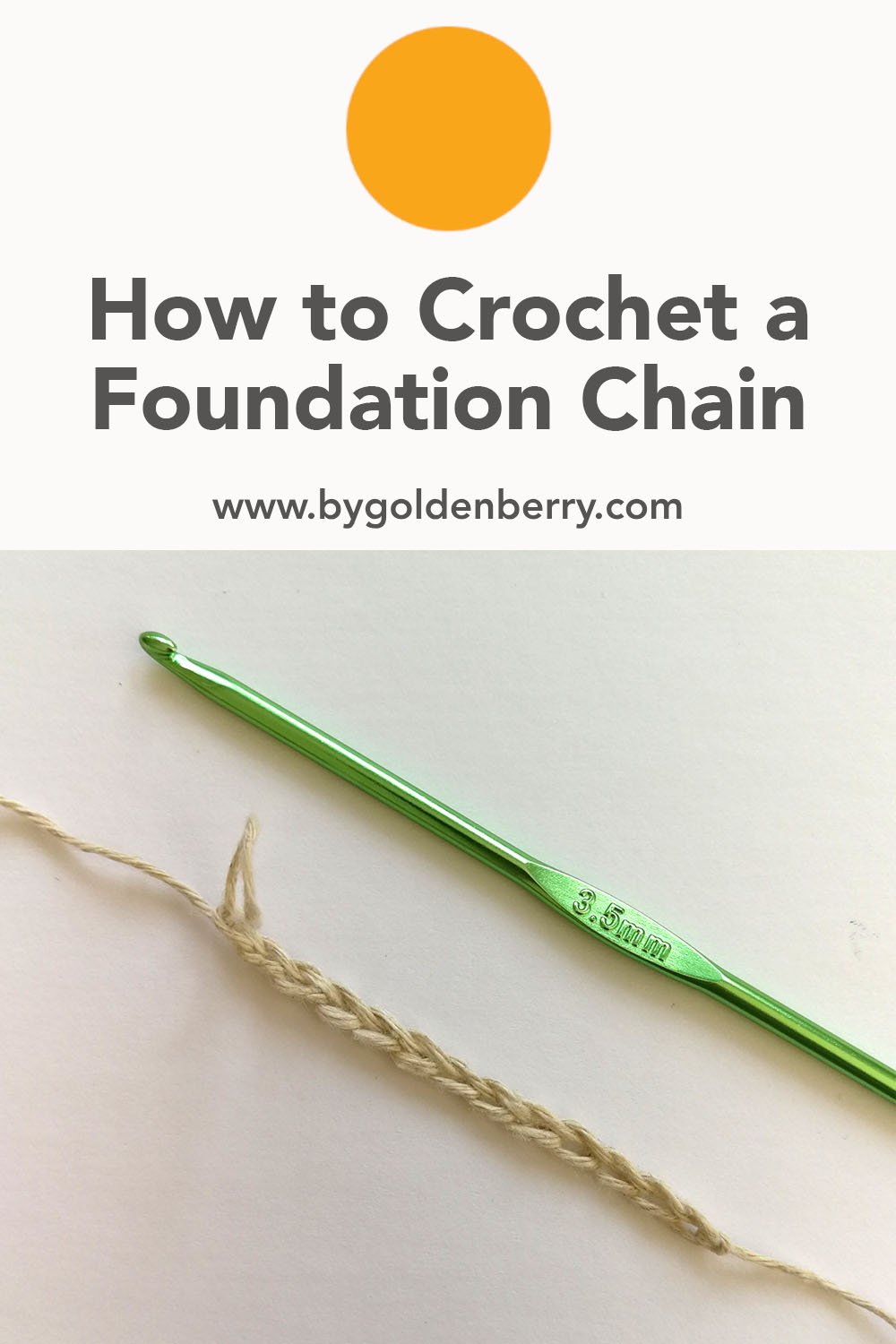 A birds eye view of a small foundation chain made in natural coloured yarn. A green crochet hook is lying parallel to it and they are both diagonal. Above, dark grey text on white reads "How to Crochet a Foundation Chain www.bygoldenberry.com".