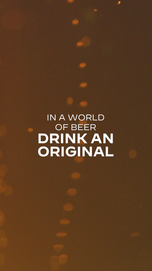 Text overlay on blurred beer glass background that reads, 'In a world of beer, drink an original.'