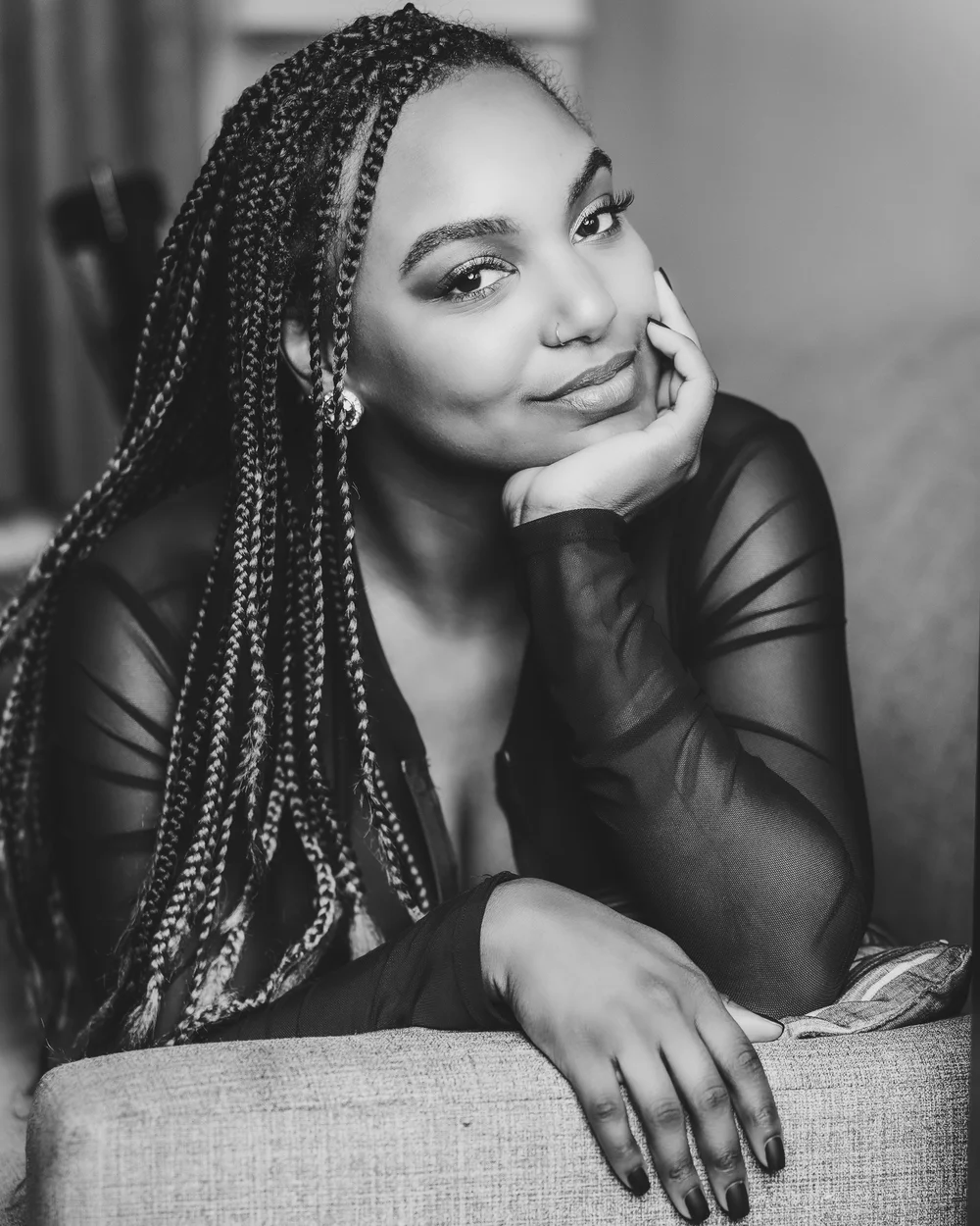 Natural-light close portrait with braids