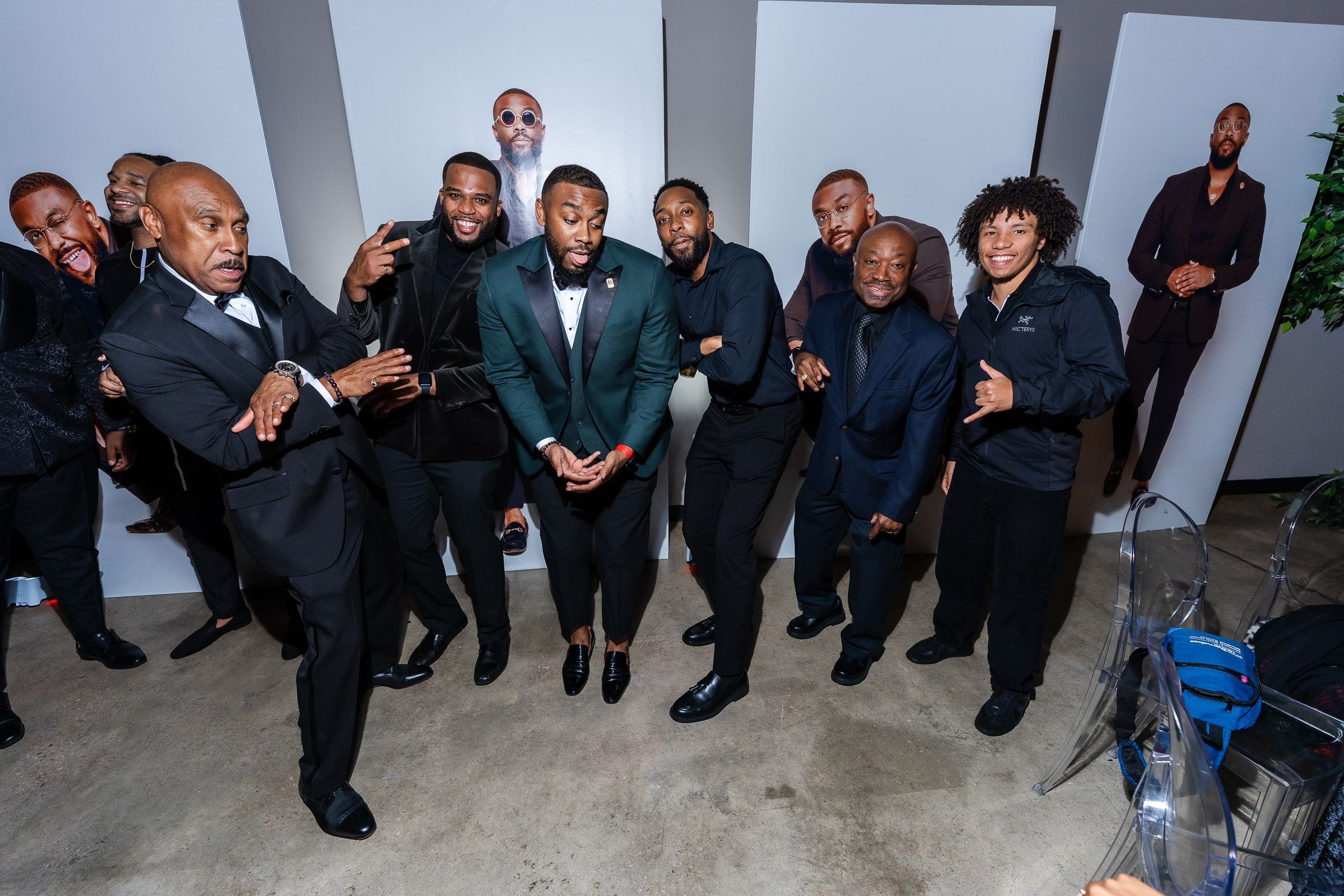 Group of guests in black-tie attire on the dance floor