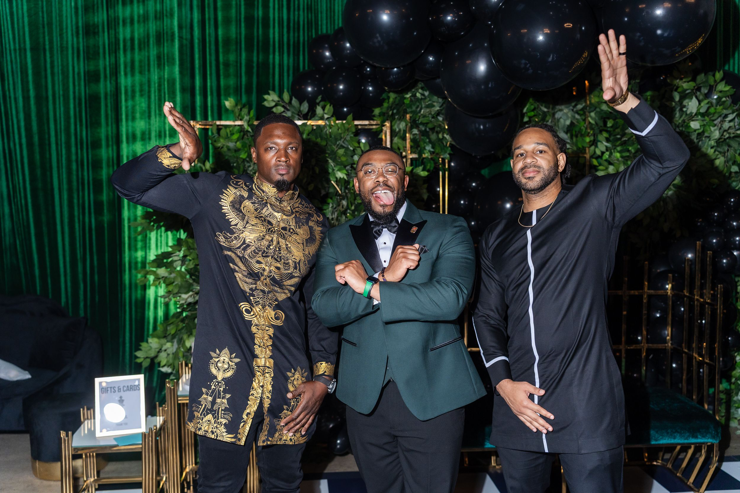 Group of men in black-tie attire posing at a Baltimore event