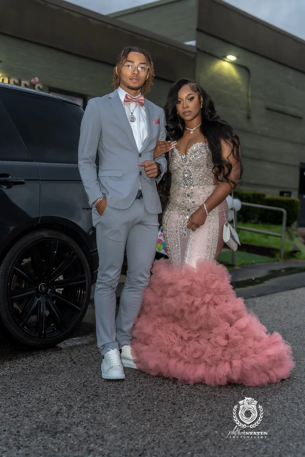 Prom couple in blush and grey at their sendoff