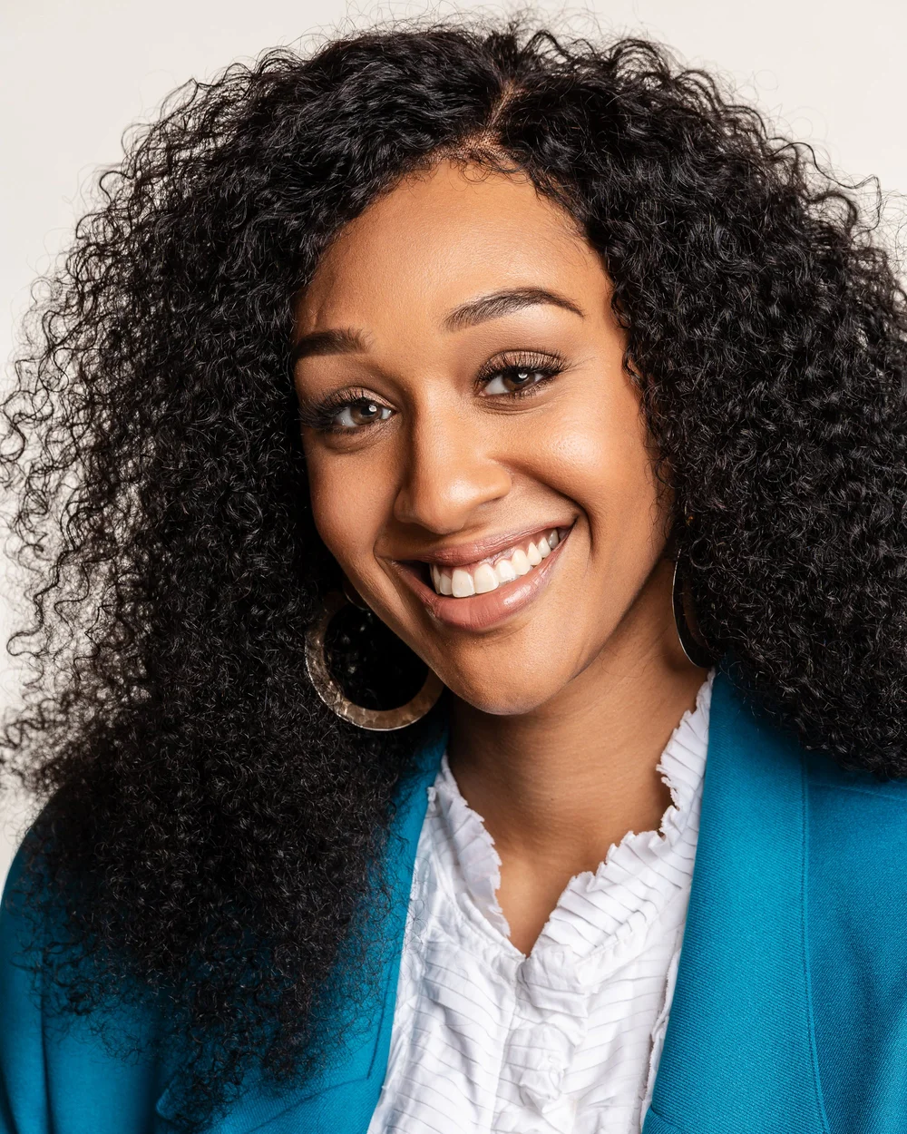 Professional business headshot portrait on a light studio backdrop, by Marcus Gregory Photography