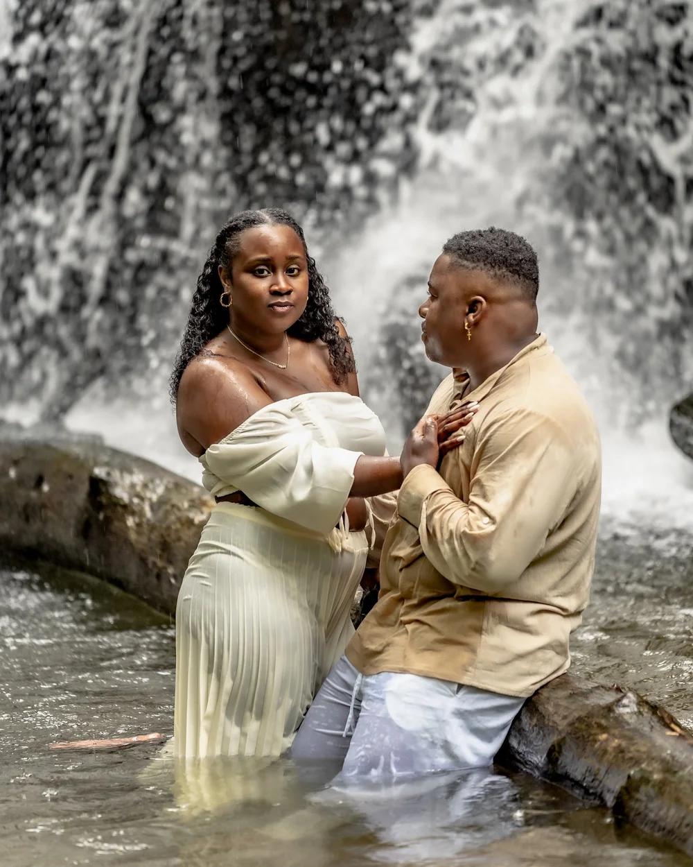 Engagement portrait of a couple in neutral tones