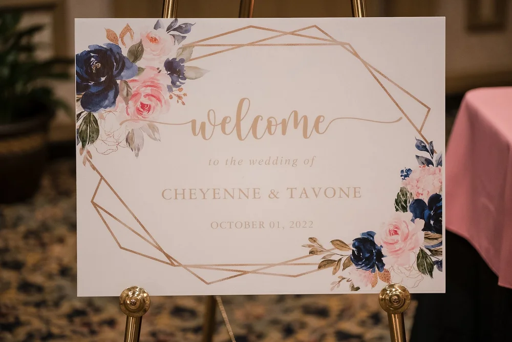 Wedding invitation suite styled with rings and florals